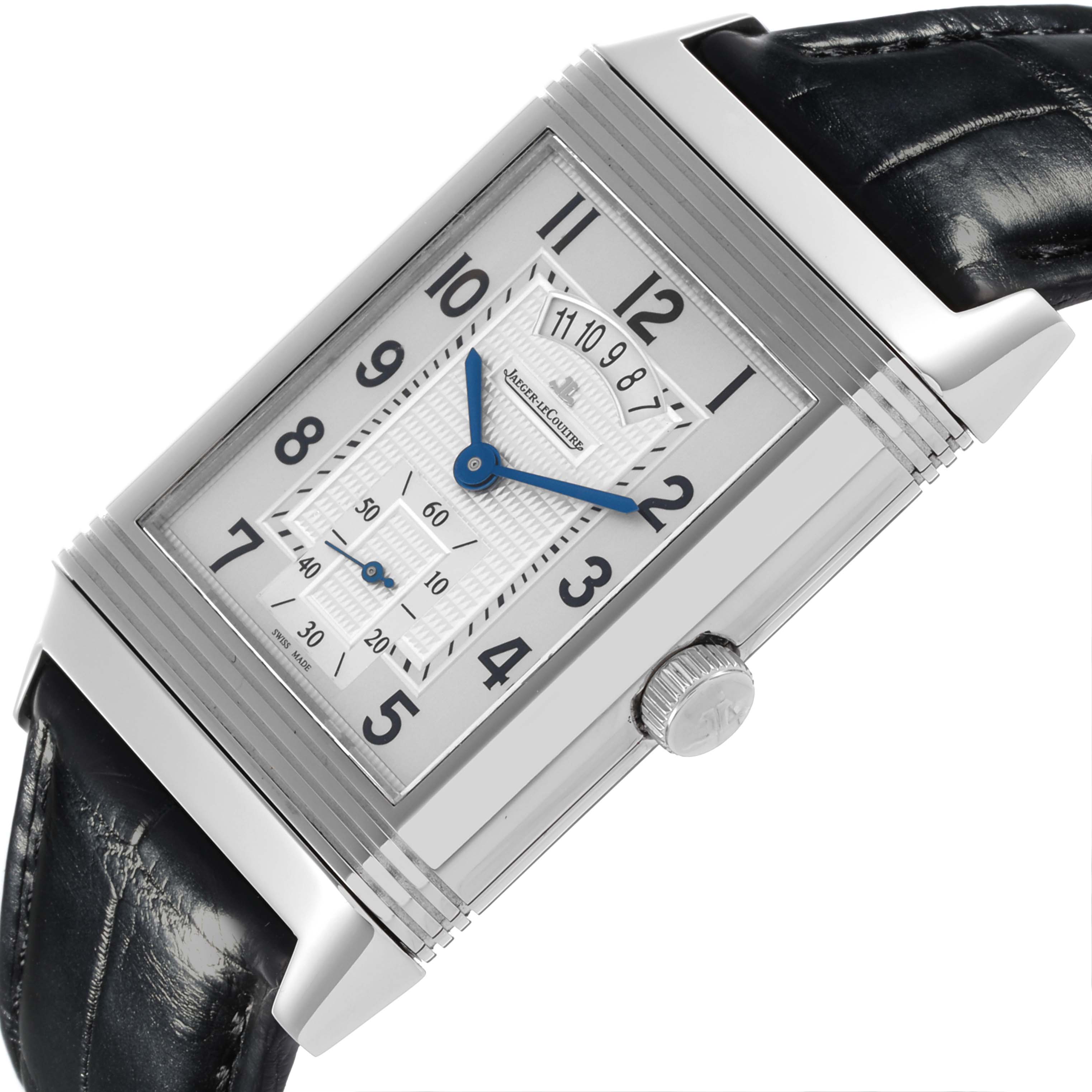 The Jaeger-LeCoultre Reverso watch is shown at an angled side view, displaying the dial, crown, and a partial leather strap.