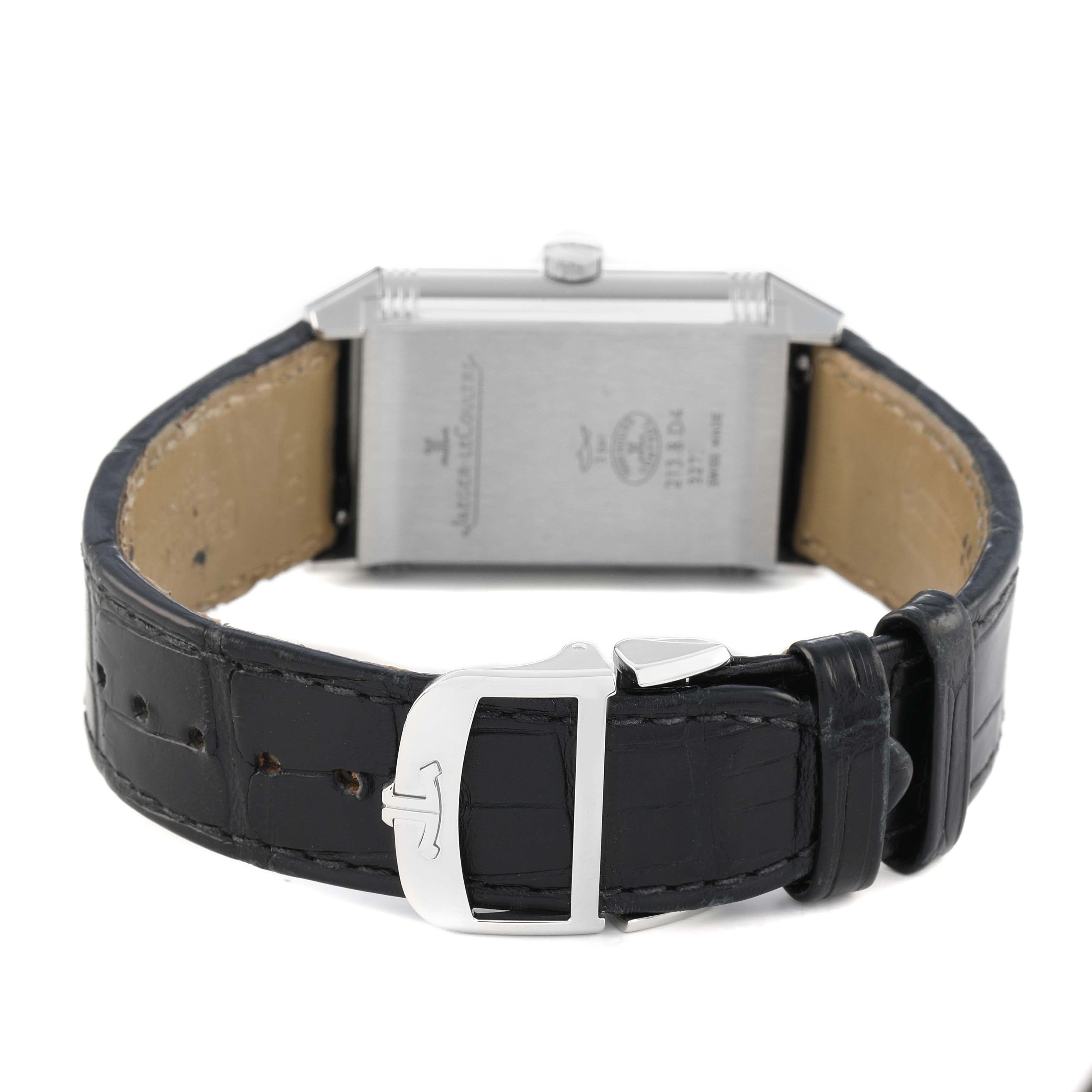 The image shows the back of a Jaeger LeCoultre Reverso 213.8.D4 Q2458420 Men's Stainless Steel Silver Dial watch, highlighting the clasp and leather strap.