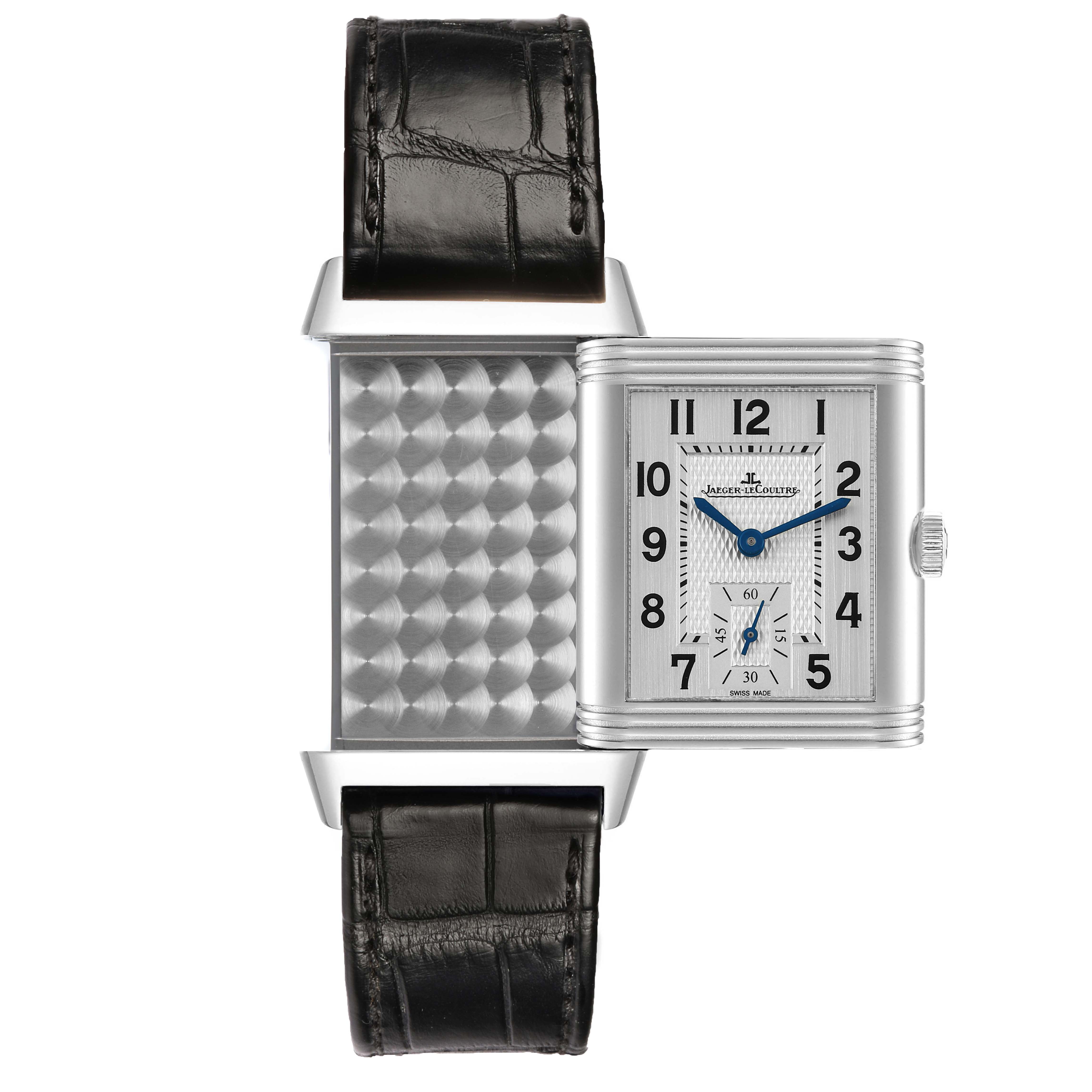 The Jaeger LeCoultre Reverso 213.8.D4 Q2458420 Men's Stainless Steel Silver Dial watch is shown in an open position, revealing both the front dial and the patterned back.