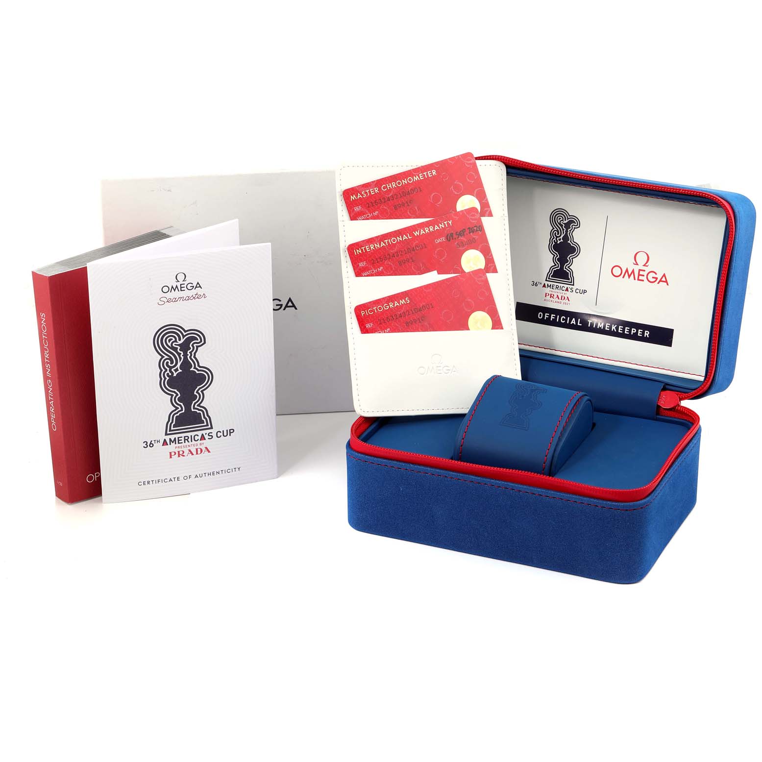 The image shows Omega Planet Ocean 215.32.43.21.04.001 Men
s Stainless Steel White Dial 215.32.43.21.04.001 Men
s Stainless Steel White Dial watch accessories including a blue and red case, warranty cards, and a certificate of Best Quality
ity.