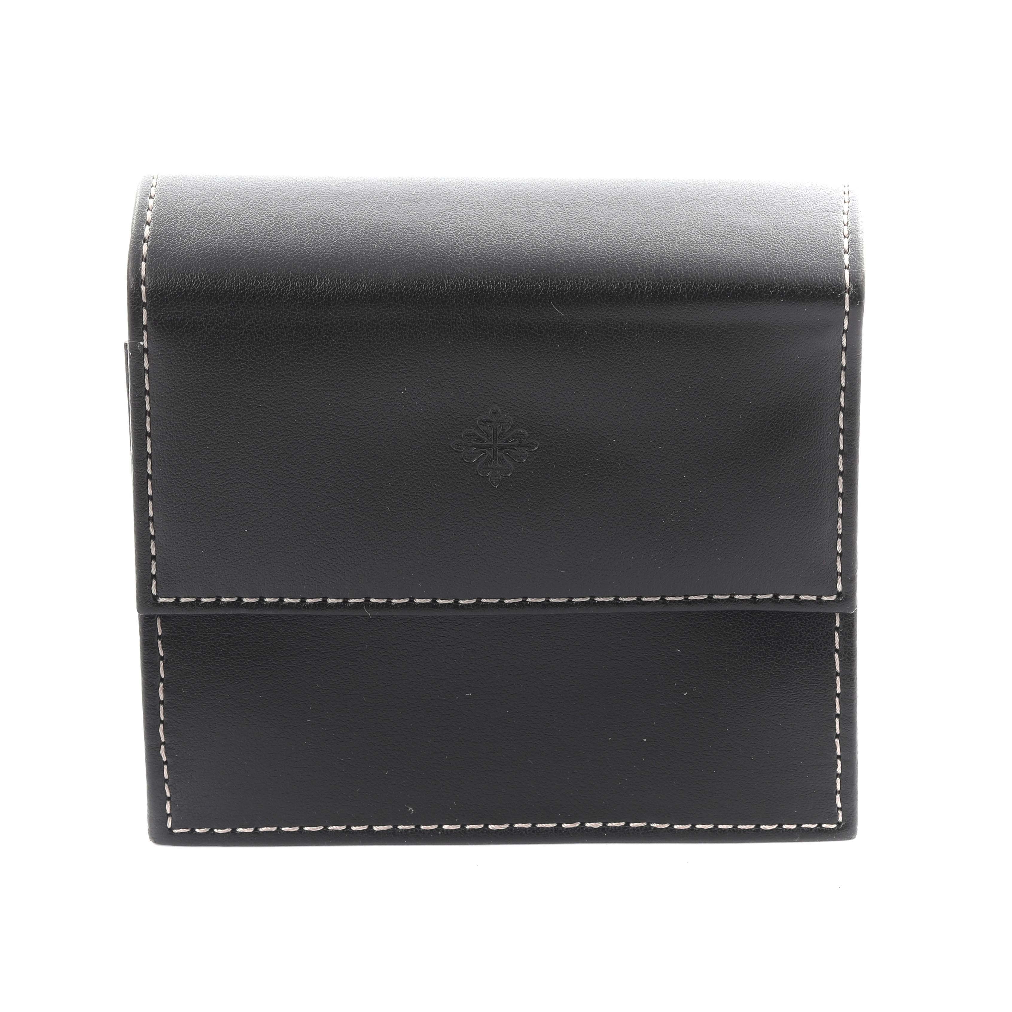 This image shows a black leather watch pouch for the Patek Philippe Calatrava 3802/200 Men's Yellow Gold White Dial 3802/200 Men's Yellow Gold White Dial, with visible stitching and an embossed logo.