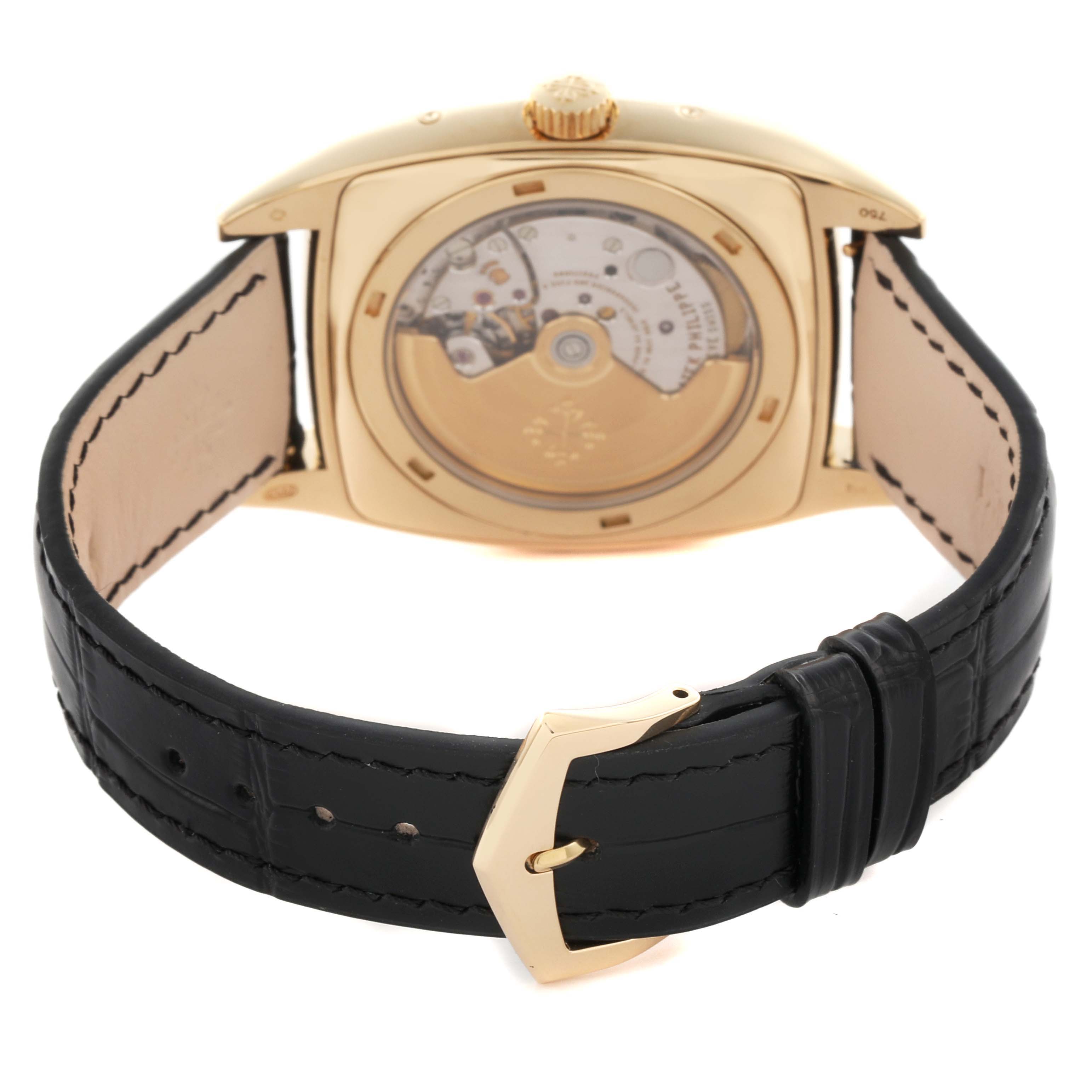 The Patek Philippe Gondolo 5135J-001 Men's Yellow Gold Silver Dial 5135J-001 Men's Yellow Gold Silver Dial watch is shown from the back, highlighting its transparent case back and black leather strap.