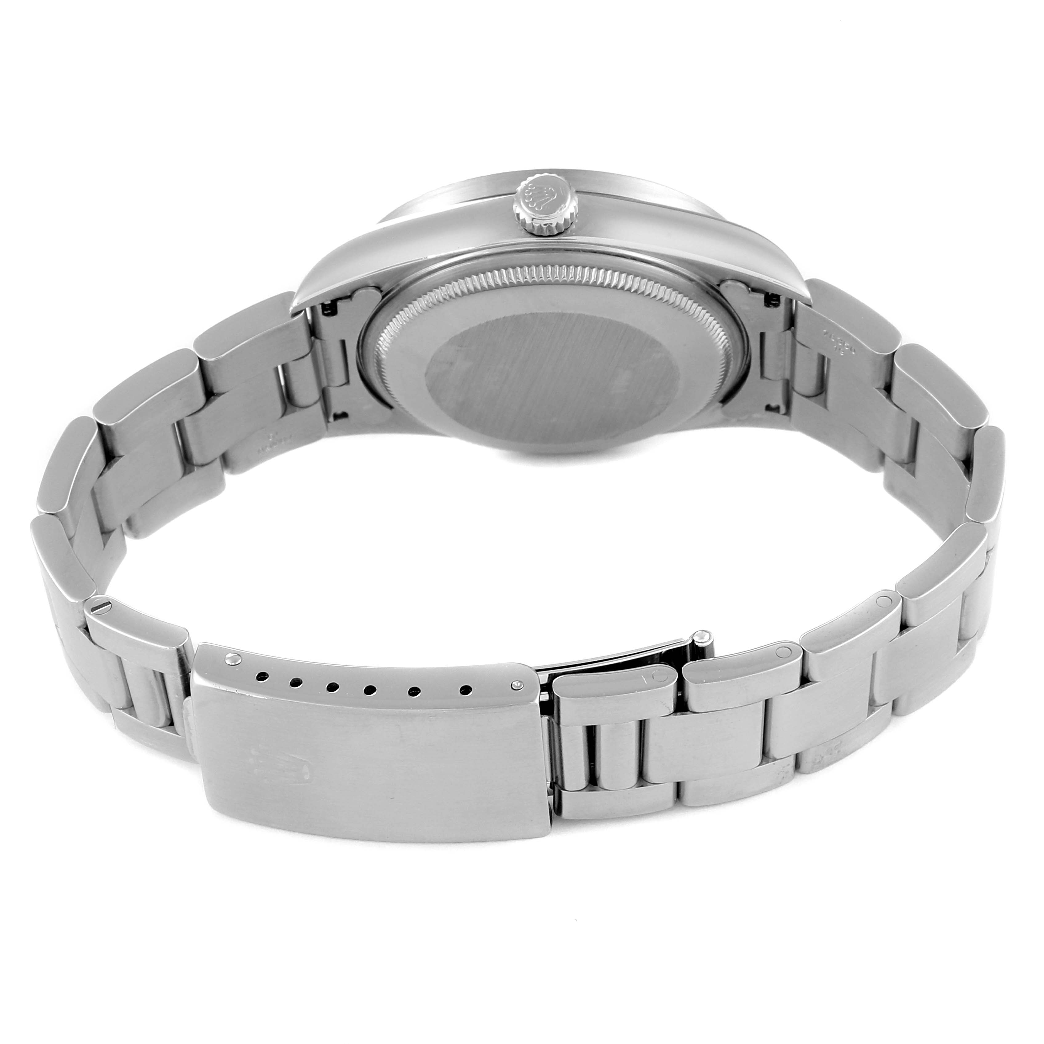 This image shows the back case and bracelet of a Rolex Air-King 14010 Men's Stainless Steel Black Dial 14010 Men's Stainless Steel Black Dial watch, viewed from the rear angle.