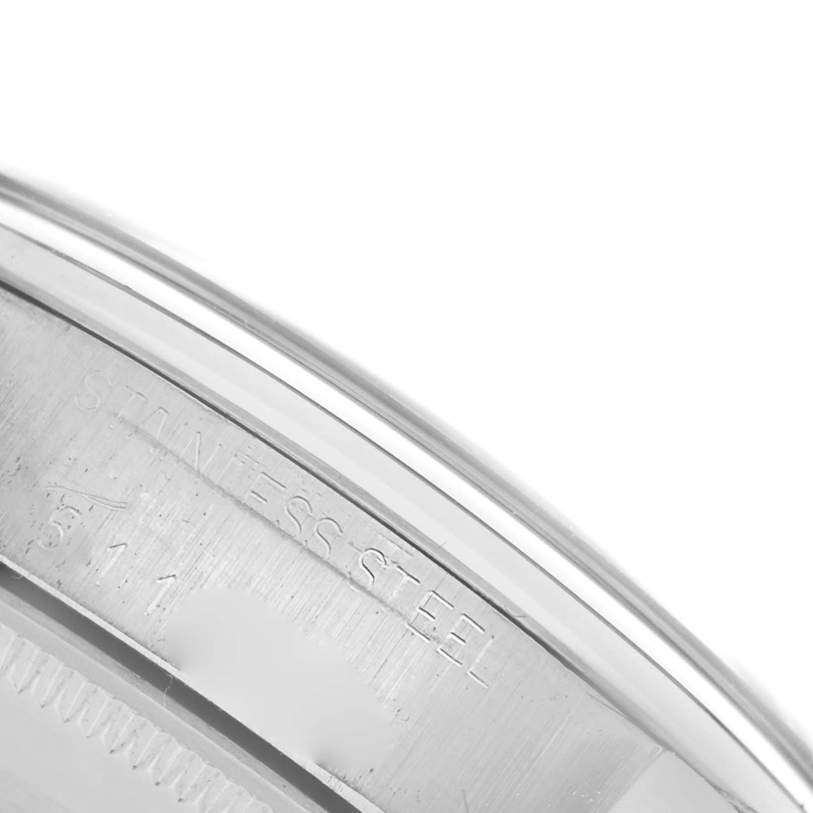 The image shows a close-up of the side of the Rolex Air-King 5500 Men's Stainless Steel Silver Dial 5500 Men's Stainless Steel Silver Dial watch, highlighting its stainless steel casing.