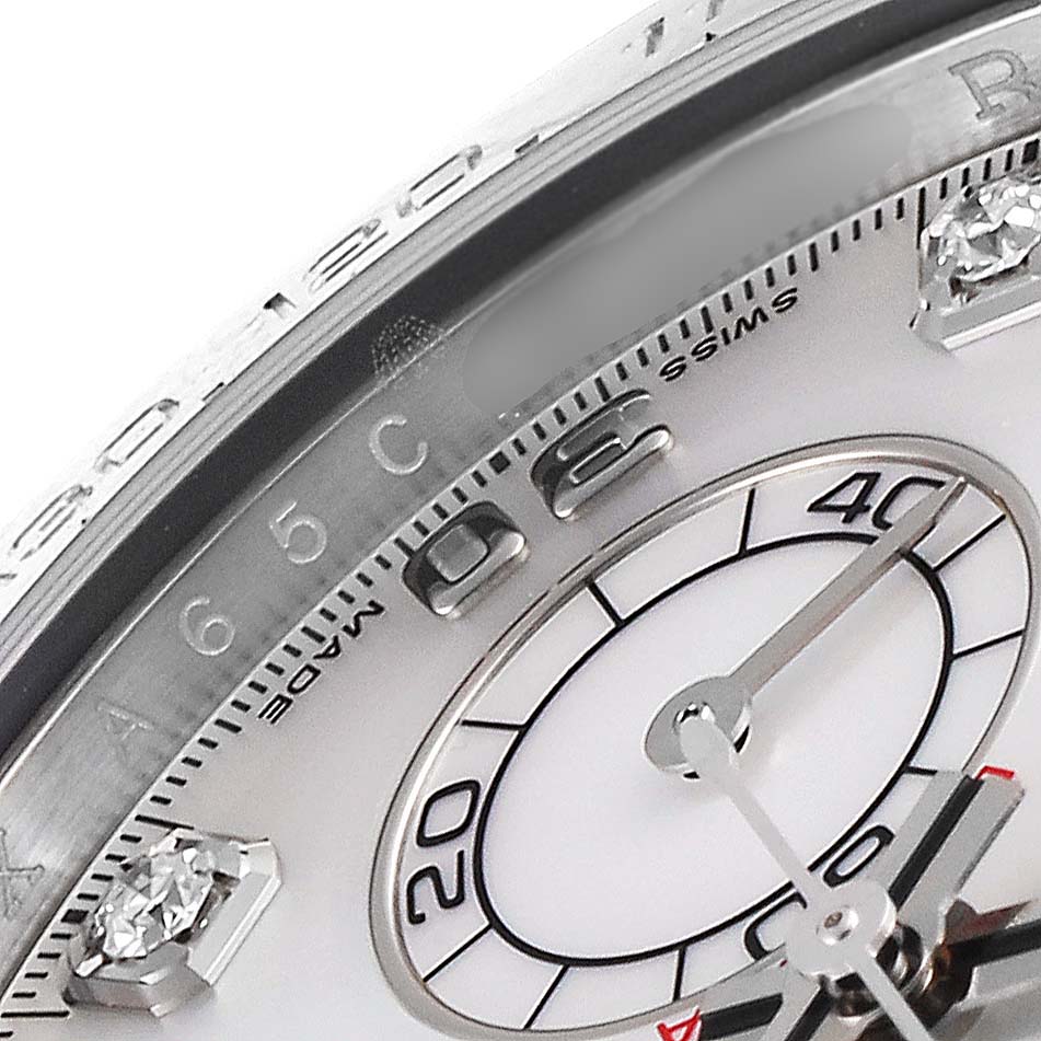 This close-up angle of the Rolex Daytona 116519 Men's White Gold Mother of Pearl Dial 116519 Men's White Gold Mother of Pearl Dial watch shows part of the bezel and the dial with diamond hour markers.