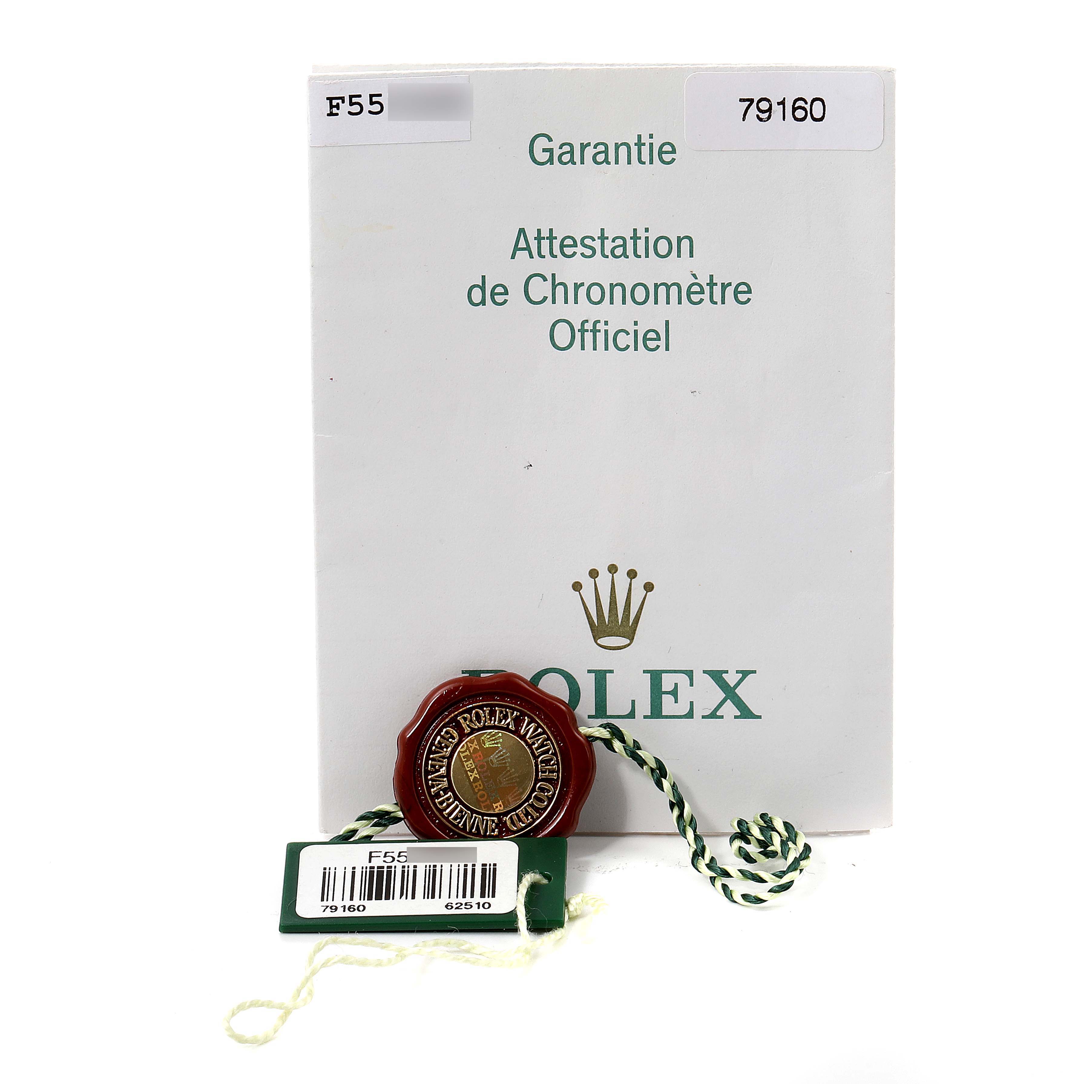 The image shows the warranty certificate and a Rolex seal for a Rolex Date 79160 Women's Stainless Steel Silver Dial 79160 Women's Stainless Steel Silver Dial model watch.