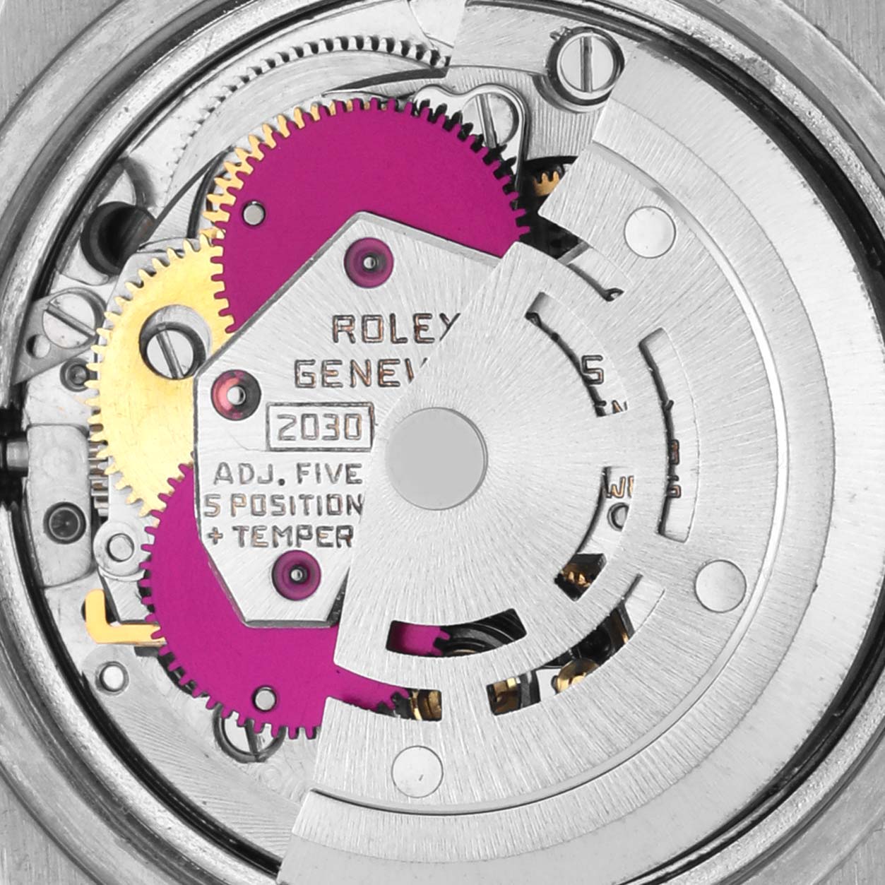 The image shows a close-up of the Rolex Date 6916 Women's Stainless Steel Grey Dial 6916 Women's Stainless Steel Grey Dial model's movement, highlighting gears and intricate components.