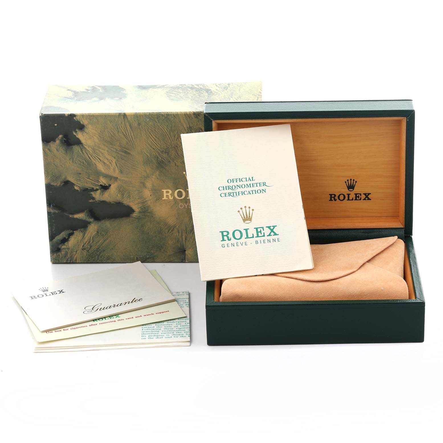 The image shows the packaging and documentation for a Rolex Date 1500 Men's Stainless Steel Grey Dial 1500 Men's Stainless Steel Grey Dial model, including the box, certificate, and guarantee cards.