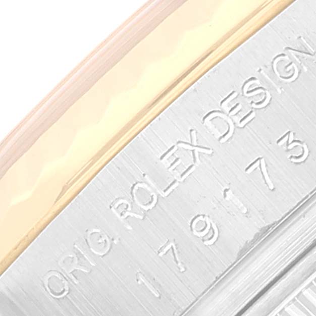 The image shows a close-up of the edge of the case with the model and brand inscription on a Rolex Datejust 179173 Women's Steel and Gold (two tone) Silver Dial 179173 Women's Steel and Gold (two tone) Silver Dial watch.