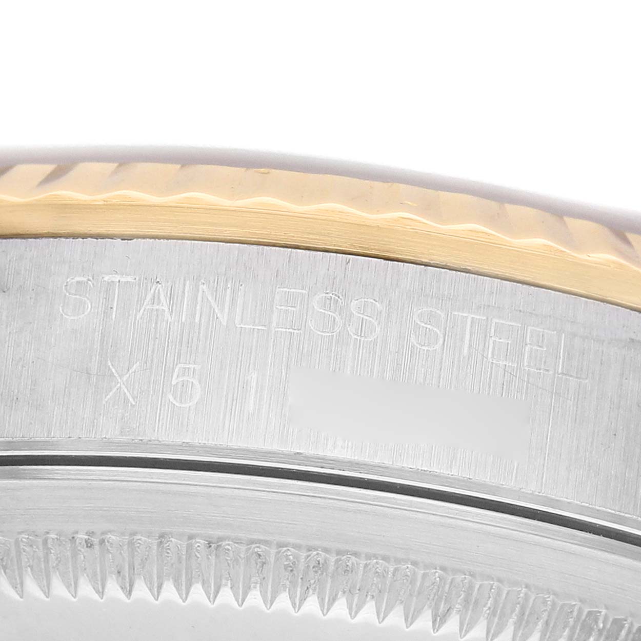 The image shows the side view of the Rolex Datejust 16233 Men's Stainless Steel Blue Dial watch case, highlighting the stainless steel part and serrated edge.