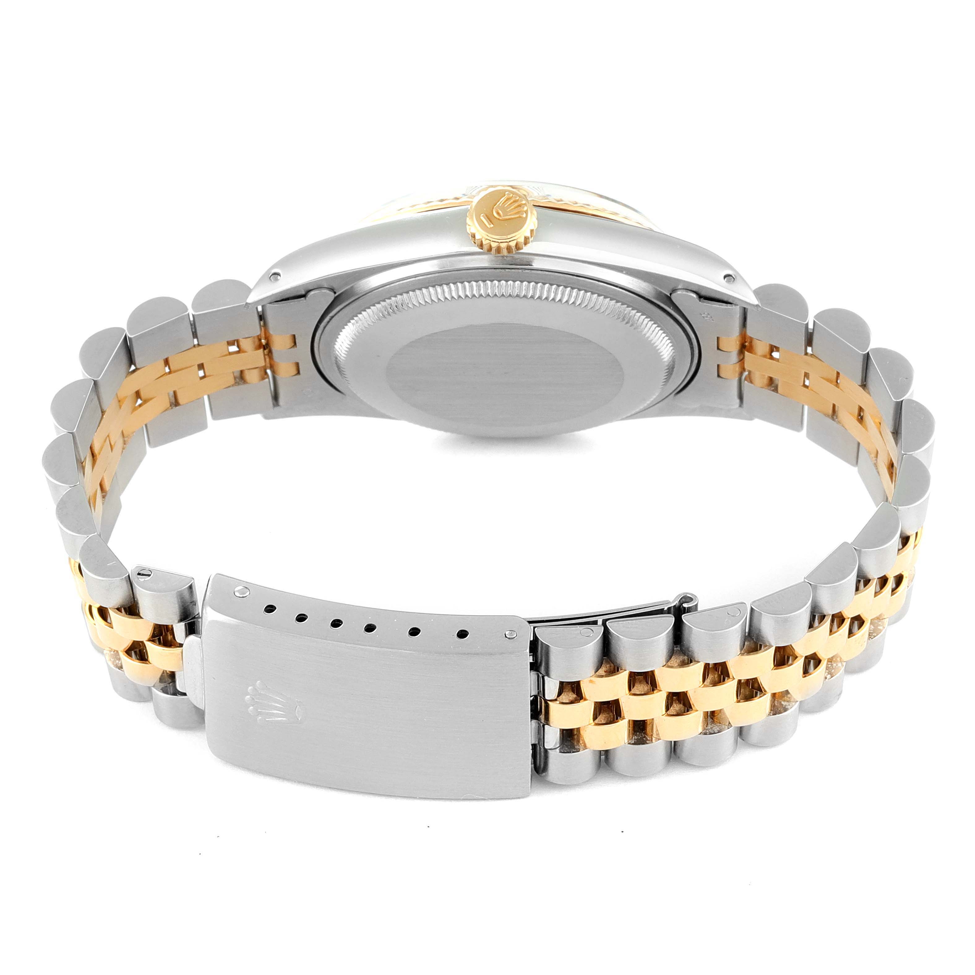 This image shows the back and clasp of a Rolex Vintage Collection 16013 Men's Steel and Gold (two tone) Champagne Dial 16013 Men's Steel and Gold (two tone) Champagne Dial model watch, highlighting its two-tone metal bracelet and crown.