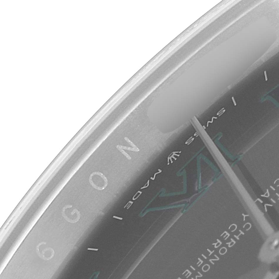 This image shows a close-up of the dial and part of the bezel of a Rolex Datejust 41 126334 Men's Stainless Steel Grey Dial 126334 Men's Stainless Steel Grey Dial watch.