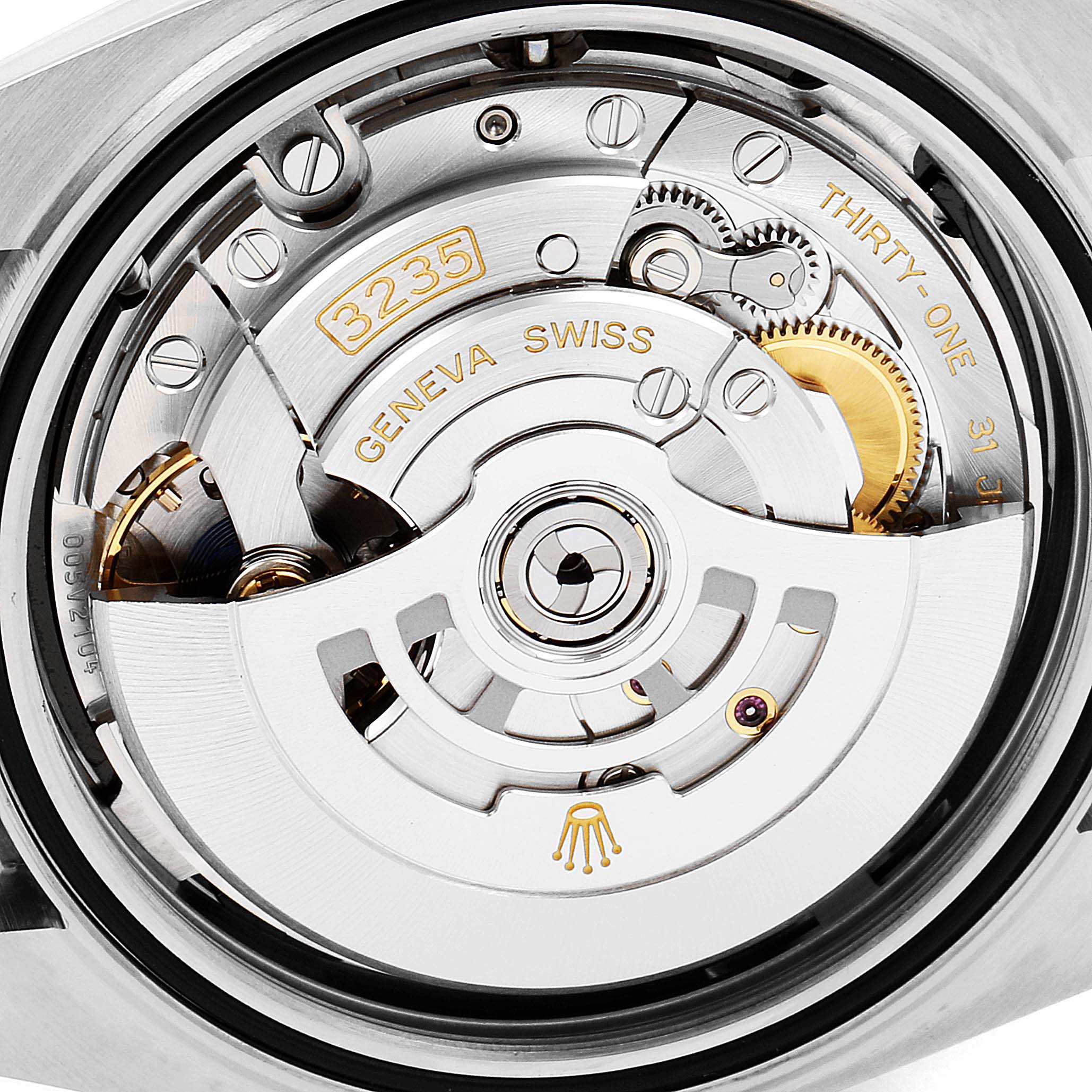 This image shows the movement and inner mechanism of the Rolex Datejust 41 126333 Men's Steel and Gold (two tone) Black Dial 126333 Men's Steel and Gold (two tone) Black Dial model, highlighting the rotor and intricate components.