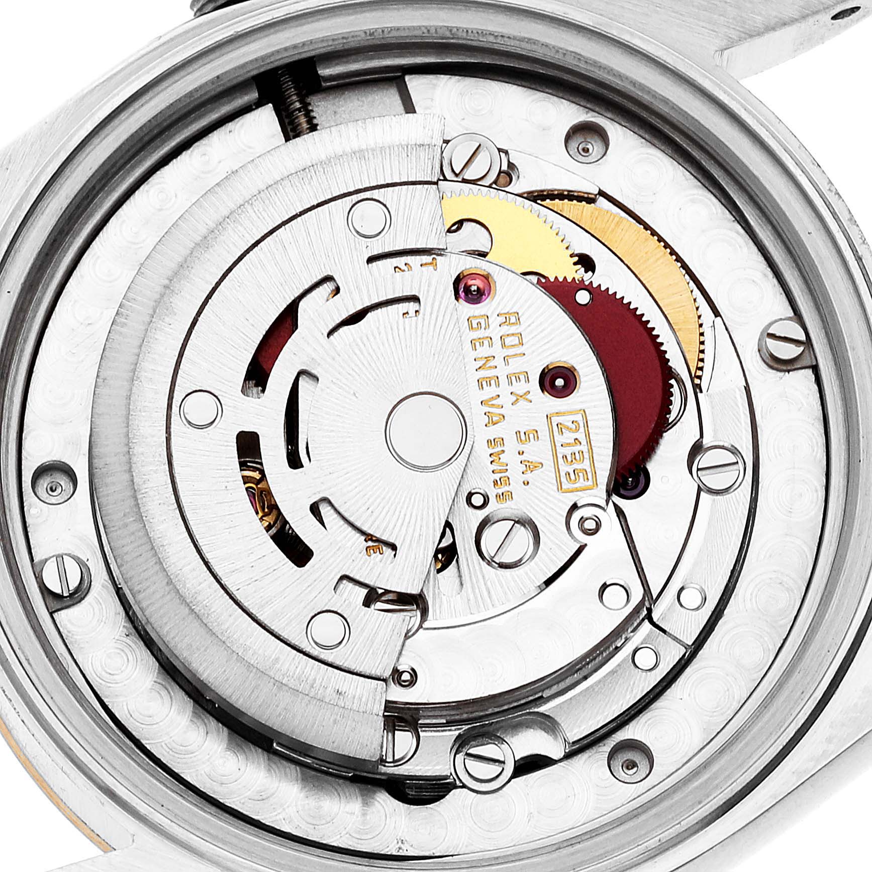 The image shows a close-up view of the internal movement mechanism of a Mid-Size Rolex watch, focusing on the intricate gears and components.