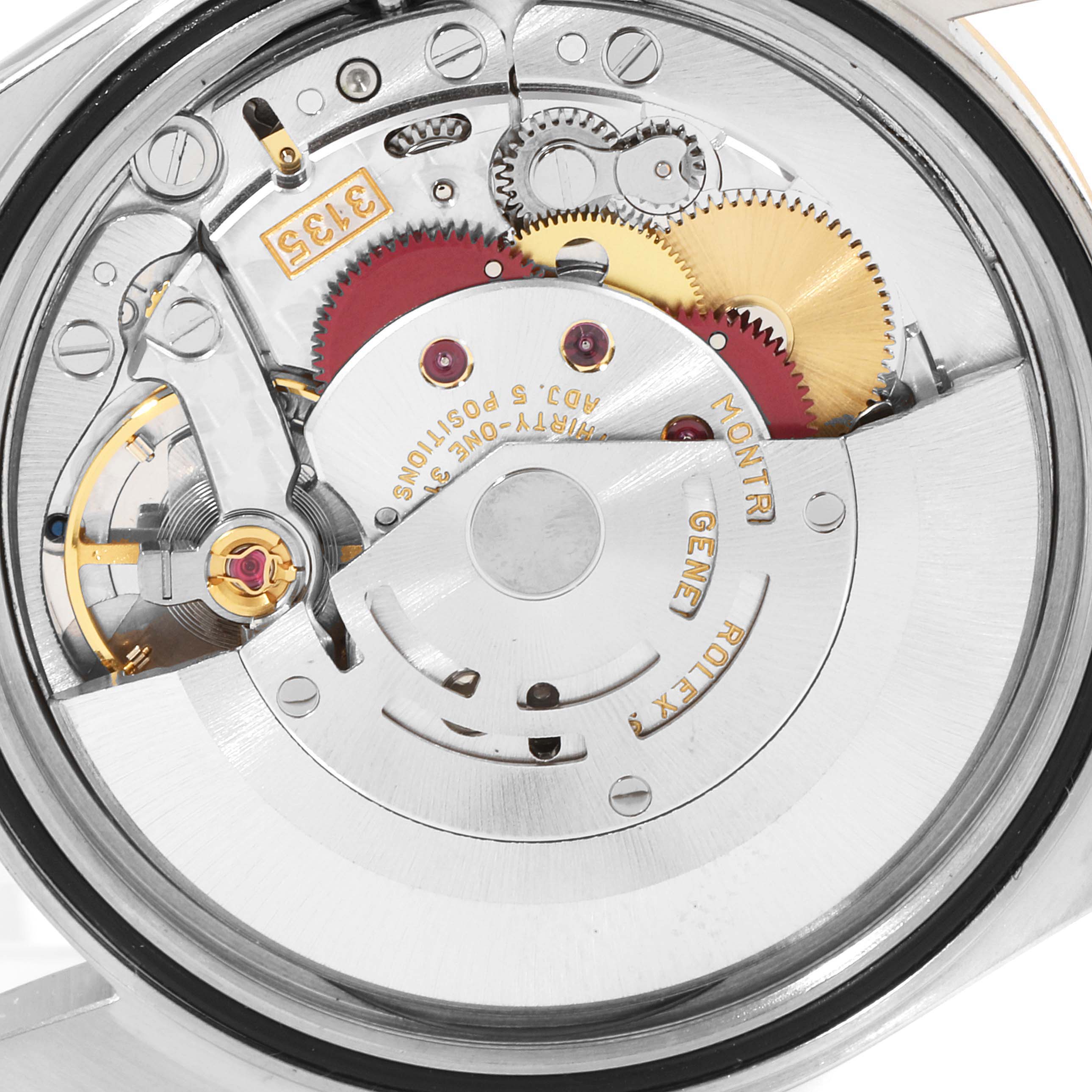 This image shows the inner mechanical movement of a Rolex Datejust 16233 Men's Steel and Gold (two tone) Mother of Pearl Dial 16233 Men's Steel and Gold (two tone) Mother of Pearl Dial watch from a back angle.