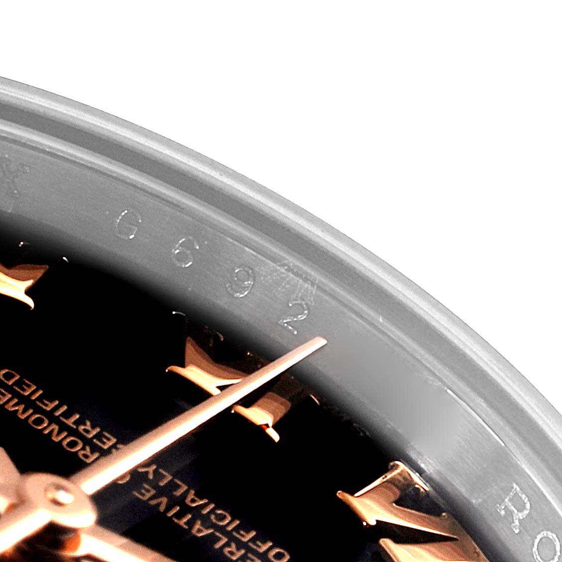 The image shows a close-up of the chapter ring and part of the dial with minute markers of a Rolex Datejust 179161 Women's Steel and Gold (two tone) Black Dial 179161 Women's Steel and Gold (two tone) Black Dial watch.