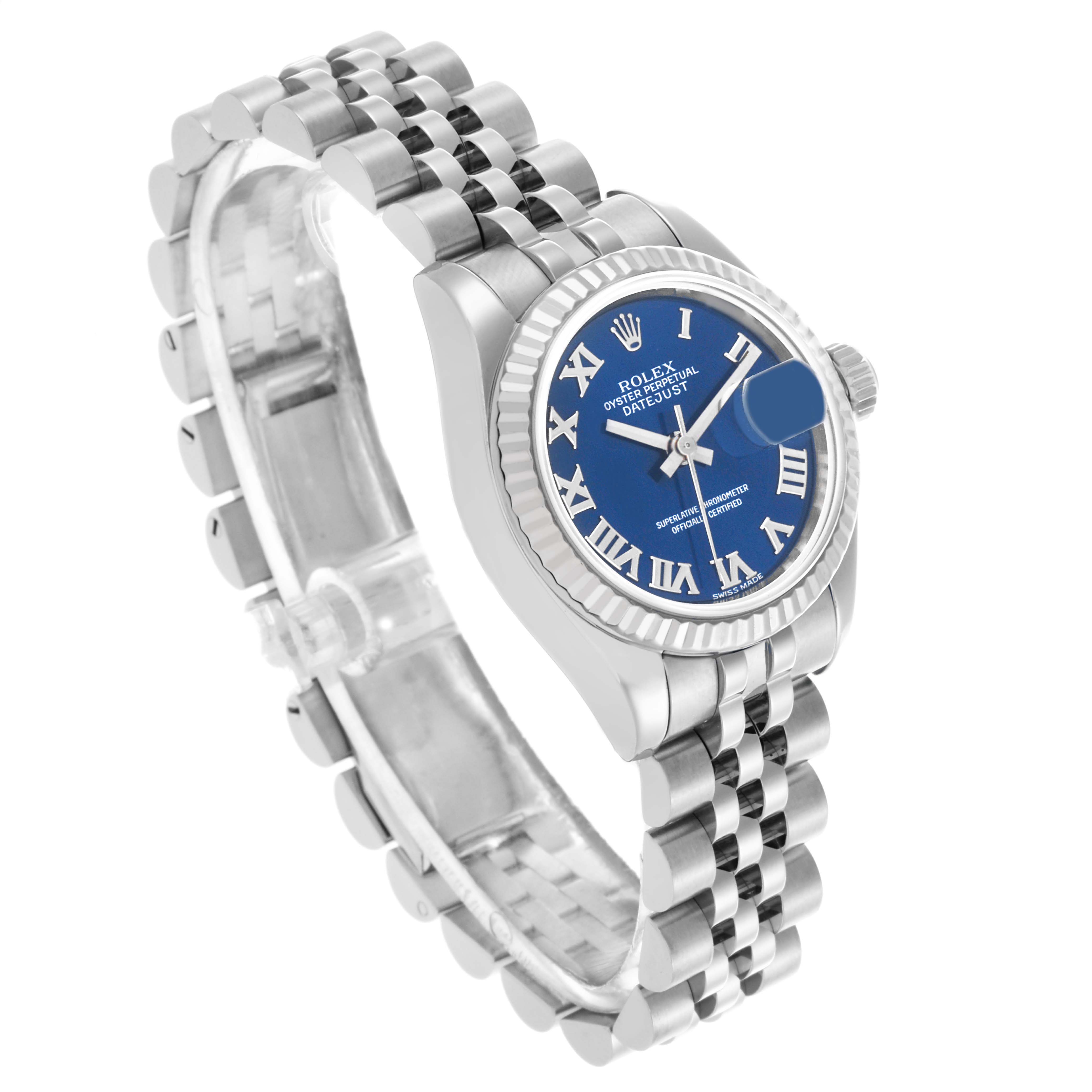 The Rolex Datejust 179174 Women's Stainless Steel Blue Dial 179174 Women's Stainless Steel Blue Dial watch is shown at a three-quarter angle, highlighting its blue dial, fluted bezel, and Jubilee bracelet.