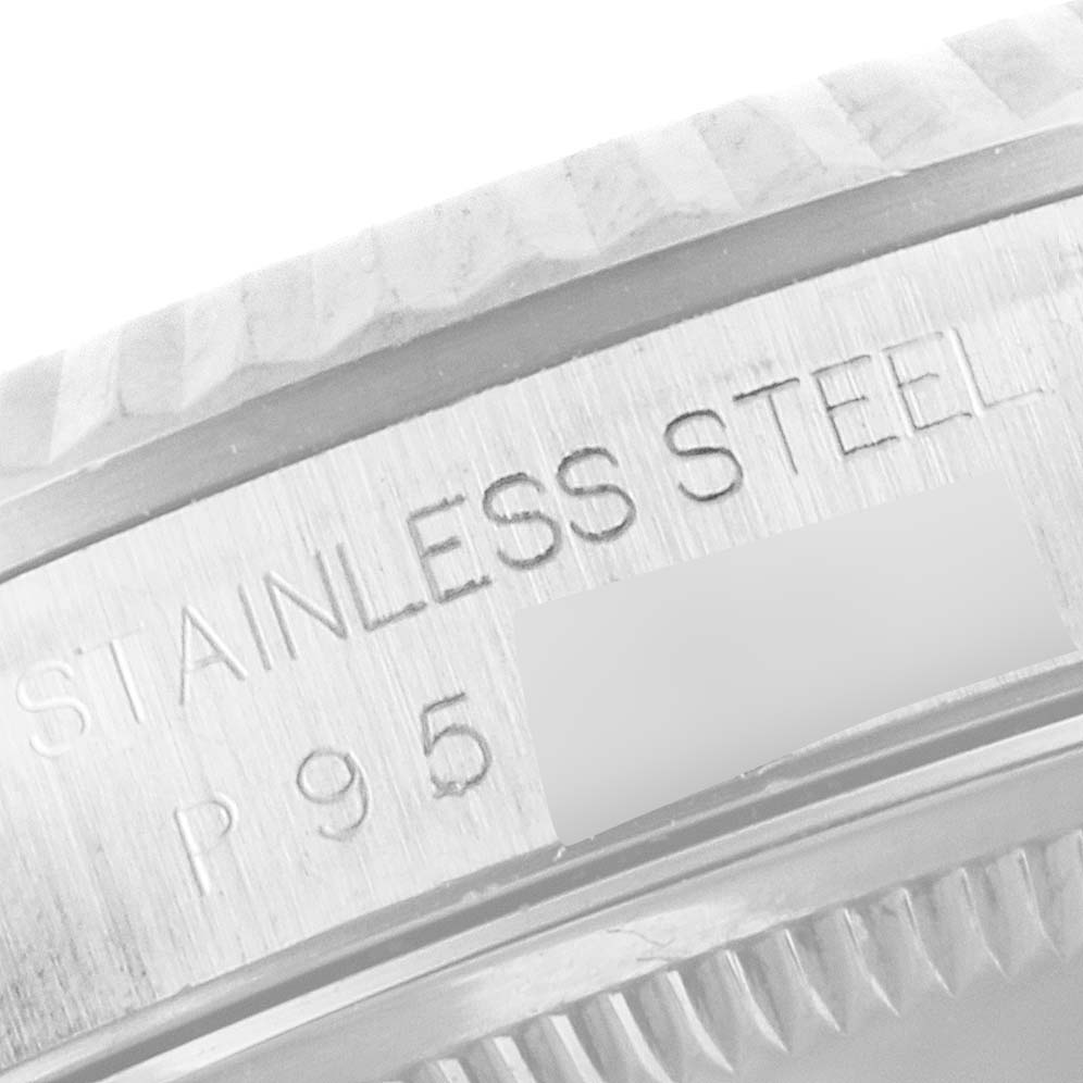 This is a close-up of the outer case and bezel of a Rolex Datejust 16234 Men
s Stainless Steel Mother of Pearl Dial 16234 Men
s Stainless Steel Mother of Pearl Dial, showing its stainless steel inscription.