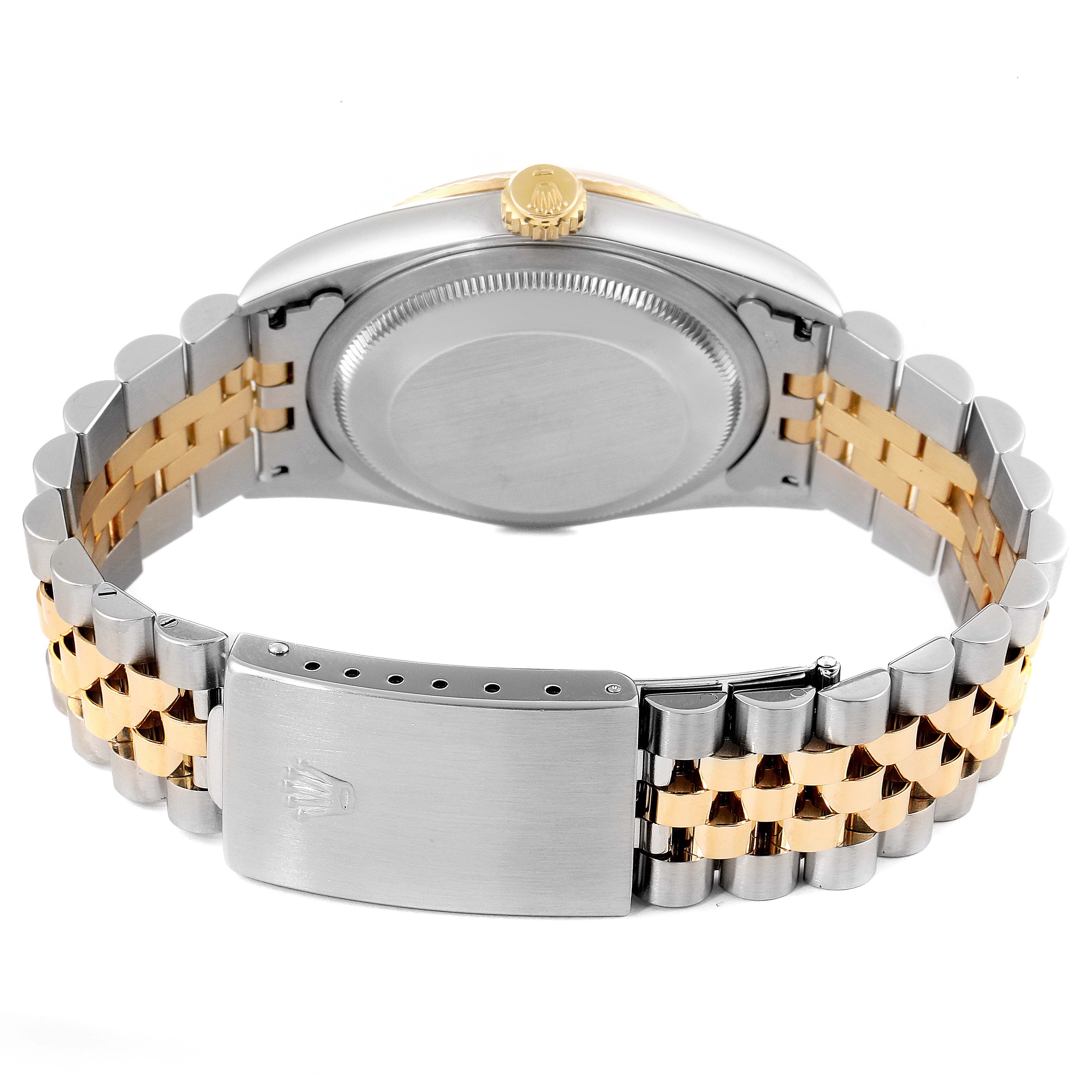 This image shows the case back, crown, and Jubilee bracelet clasp of a Rolex Datejust 16233 Men's Steel and Gold (two tone) Champagne Dial 16233 Men's Steel and Gold (two tone) Champagne Dial watch from a rear angle.