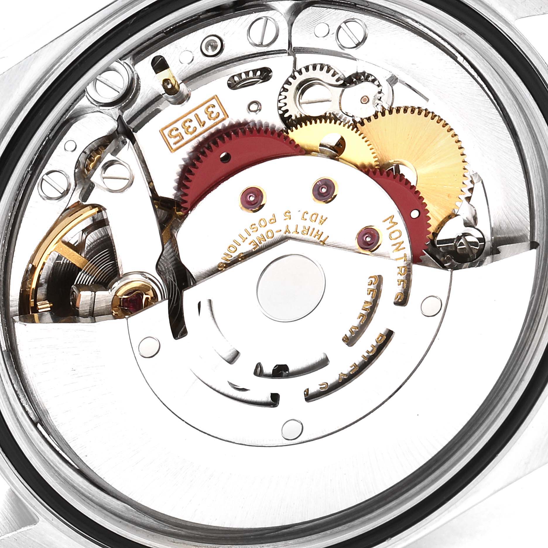 This is a close-up view of the movement mechanism inside a Rolex Datejust 16233 Men's Steel and Gold (two tone) Champagne Dial 16233 Men's Steel and Gold (two tone) Champagne Dial watch, showing gears and intricate components.
