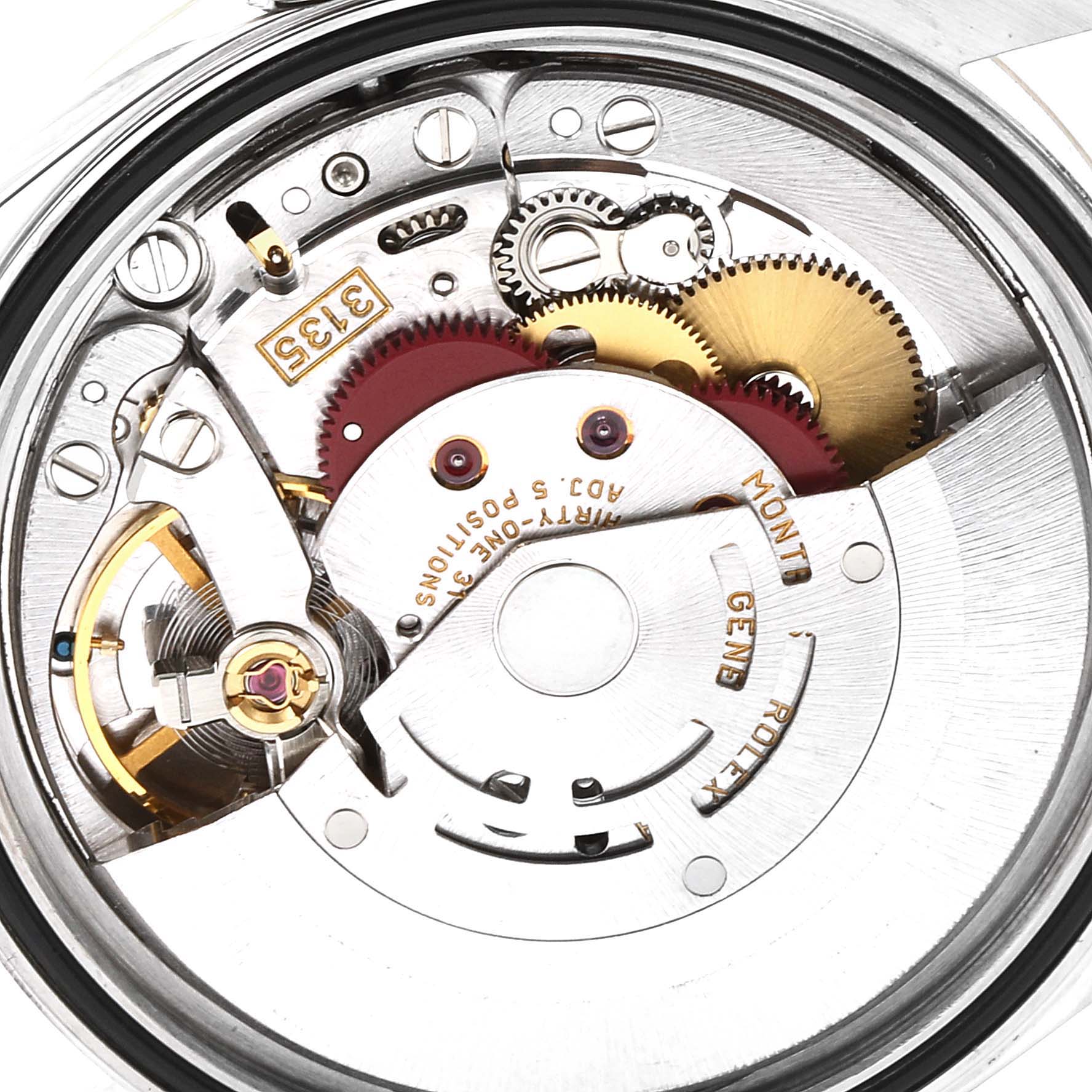 This image shows a close-up of the movement mechanism of a Rolex Datejust 16233 Men's Steel and Gold (two tone) Blue Dial 16233 Men's Steel and Gold (two tone) Blue Dial watch.