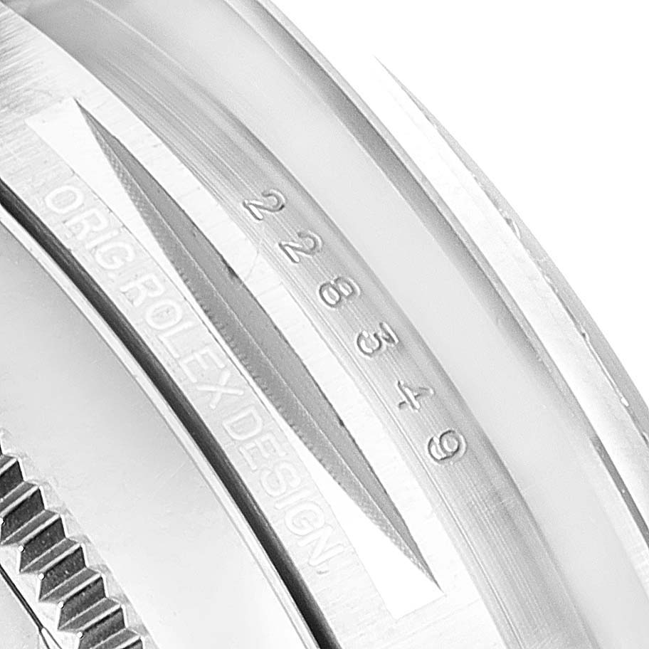 The image shows a close-up of the case side and the engraved serial number of the Rolex President 228349 Men
s White Gold Silver Dial 228349 Men
s White Gold Silver Dial model watch.