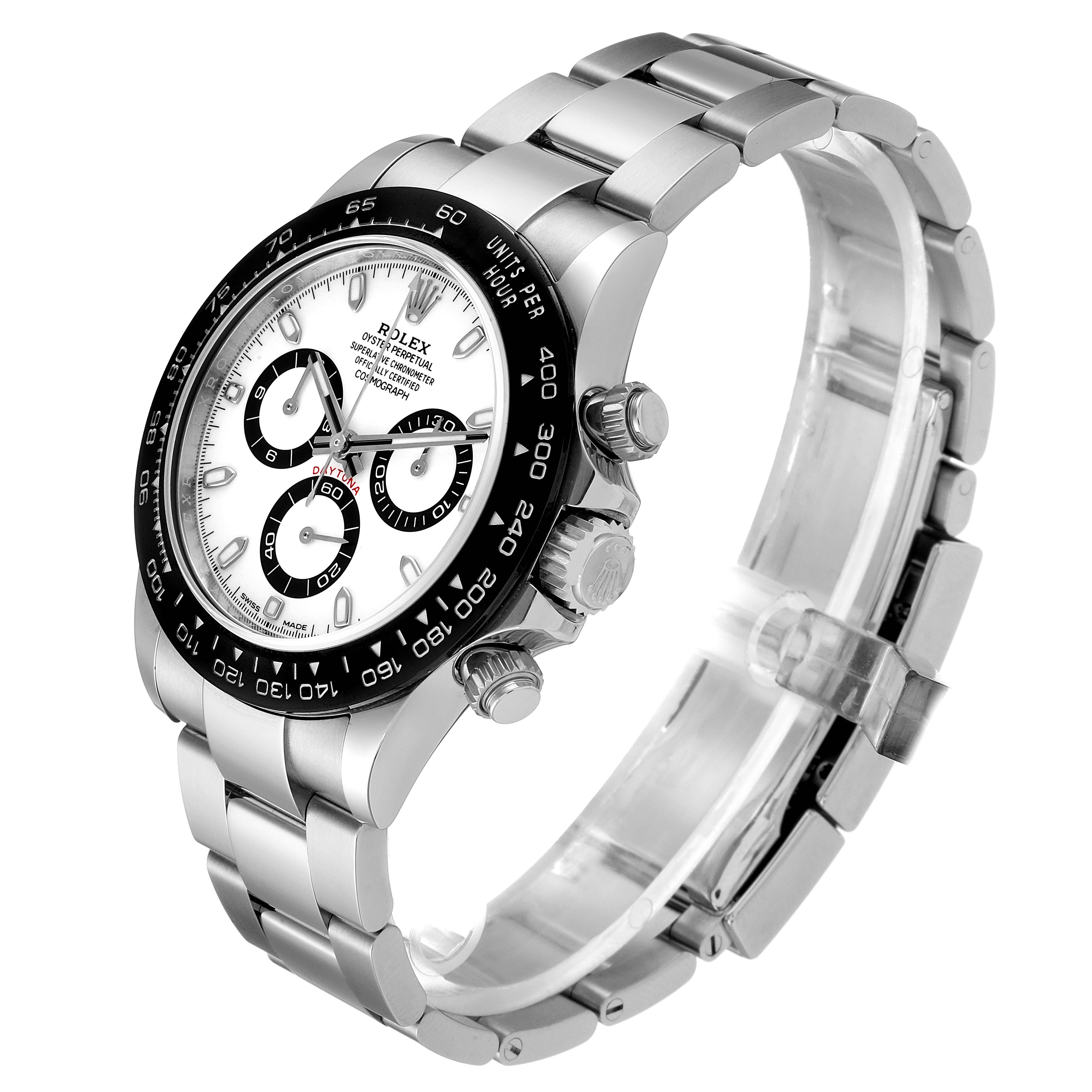 The image shows a side angle of a Rolex Daytona 116500 Men's Stainless Steel White Dial 116500 Men's Stainless Steel White Dial watch, highlighting its face, bezel, pushers, and bracelet.