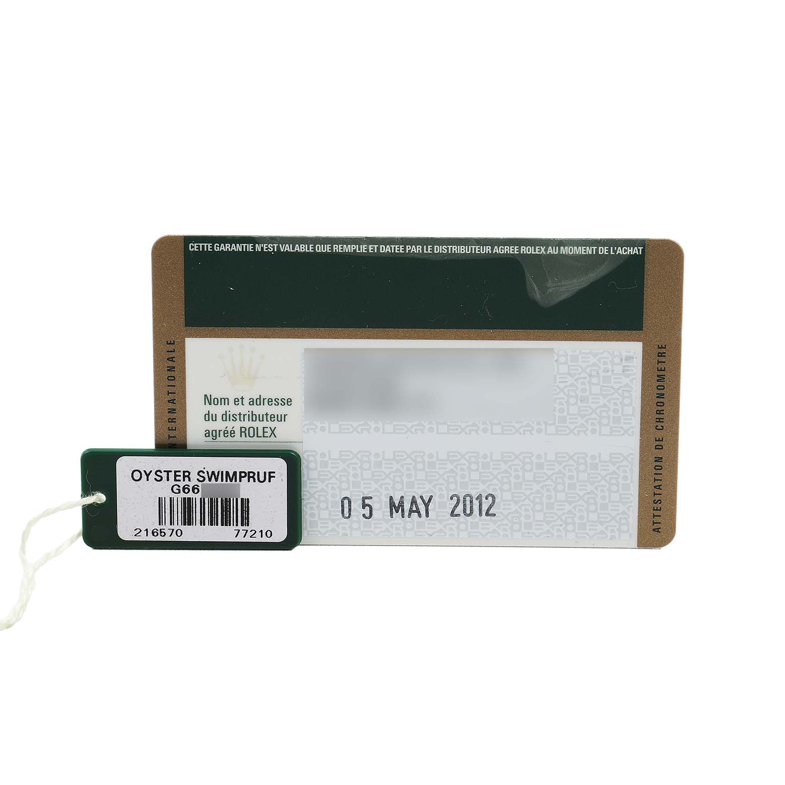 The image shows a warranty card and tag for the Rolex Explorer 216570 Men's Stainless Steel White Dial, indicating model details and purchase date.