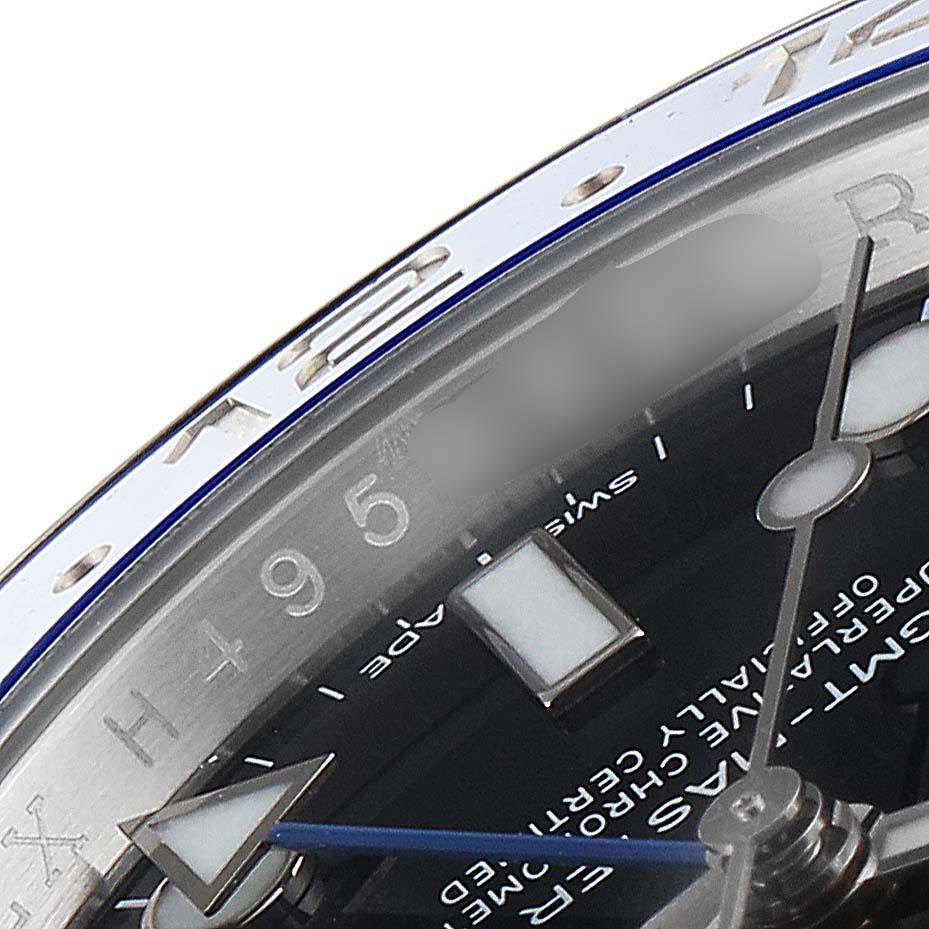 The image shows a close-up of the bezel and dial of a Rolex GMT-Master 116710 Men
s Stainless Steel Black Dial 116710 Men
s Stainless Steel Black Dial watch.