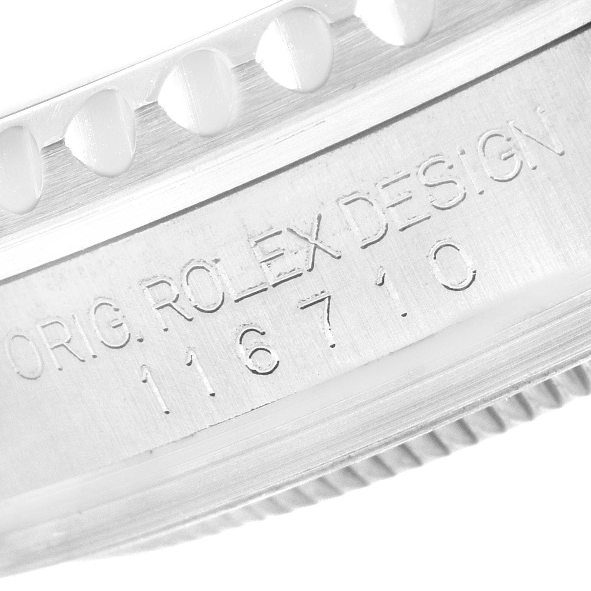 This is a close-up of the casing and bezel teeth of a Rolex GMT-Master 116710 Men
s Stainless Steel Black Dial 116710 Men
s Stainless Steel Black Dial watch, showing the model number 116710.