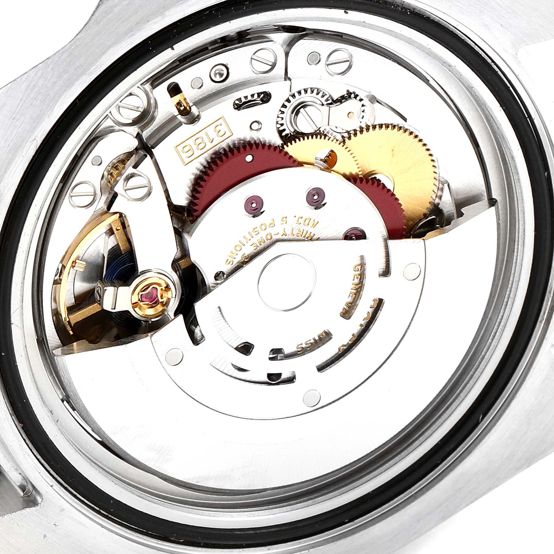 This image shows a close-up view of the movement inside a Rolex GMT-Master 116710 Men
s Stainless Steel Black Dial 116710 Men
s Stainless Steel Black Dial watch, focusing on the gears and intricate mechanism.