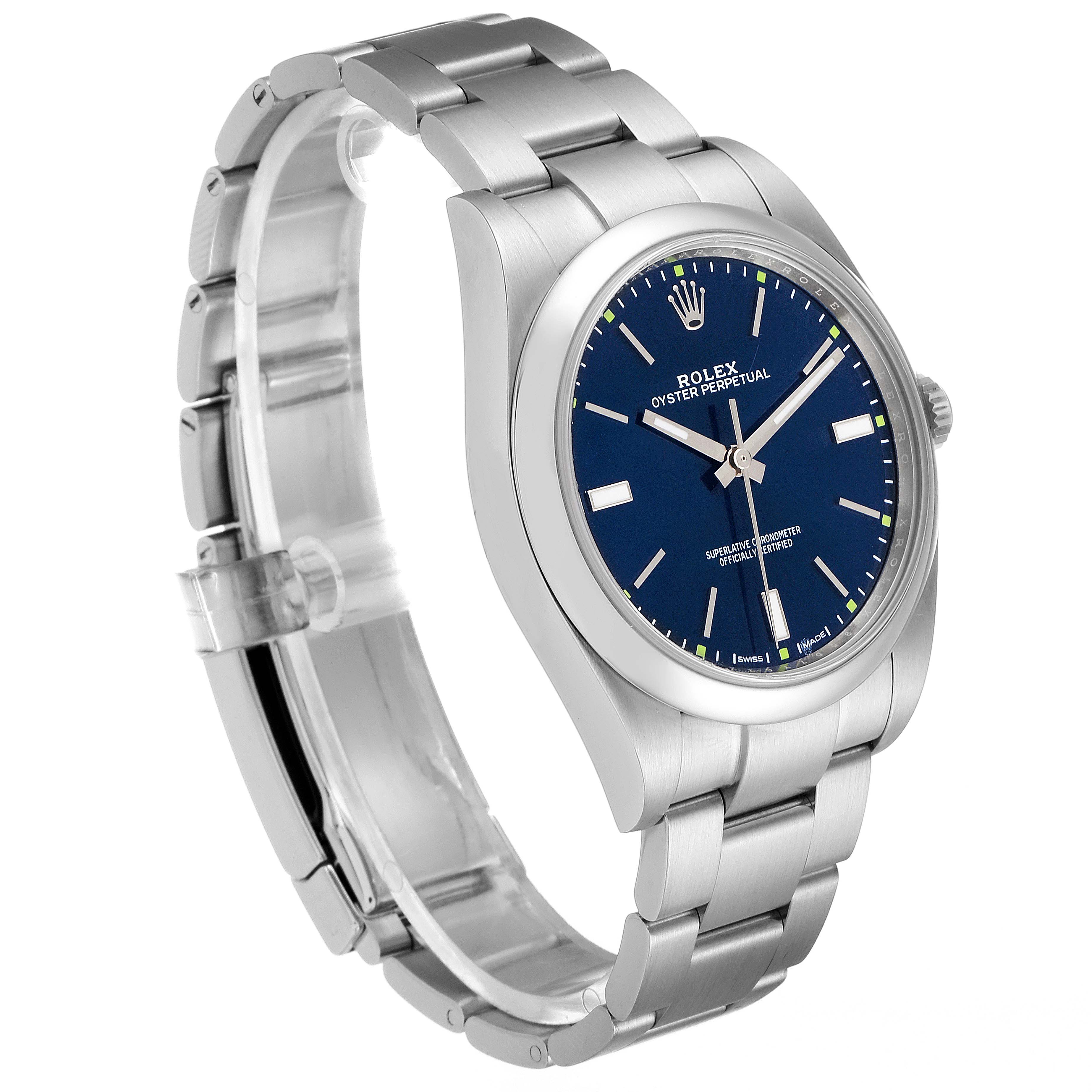 This image shows a Rolex Oyster Perpetual 114300 Men's Stainless Steel Blue Dial 114300 Men's Stainless Steel Blue Dial watch angled to display its face, bracelet, and clasp.