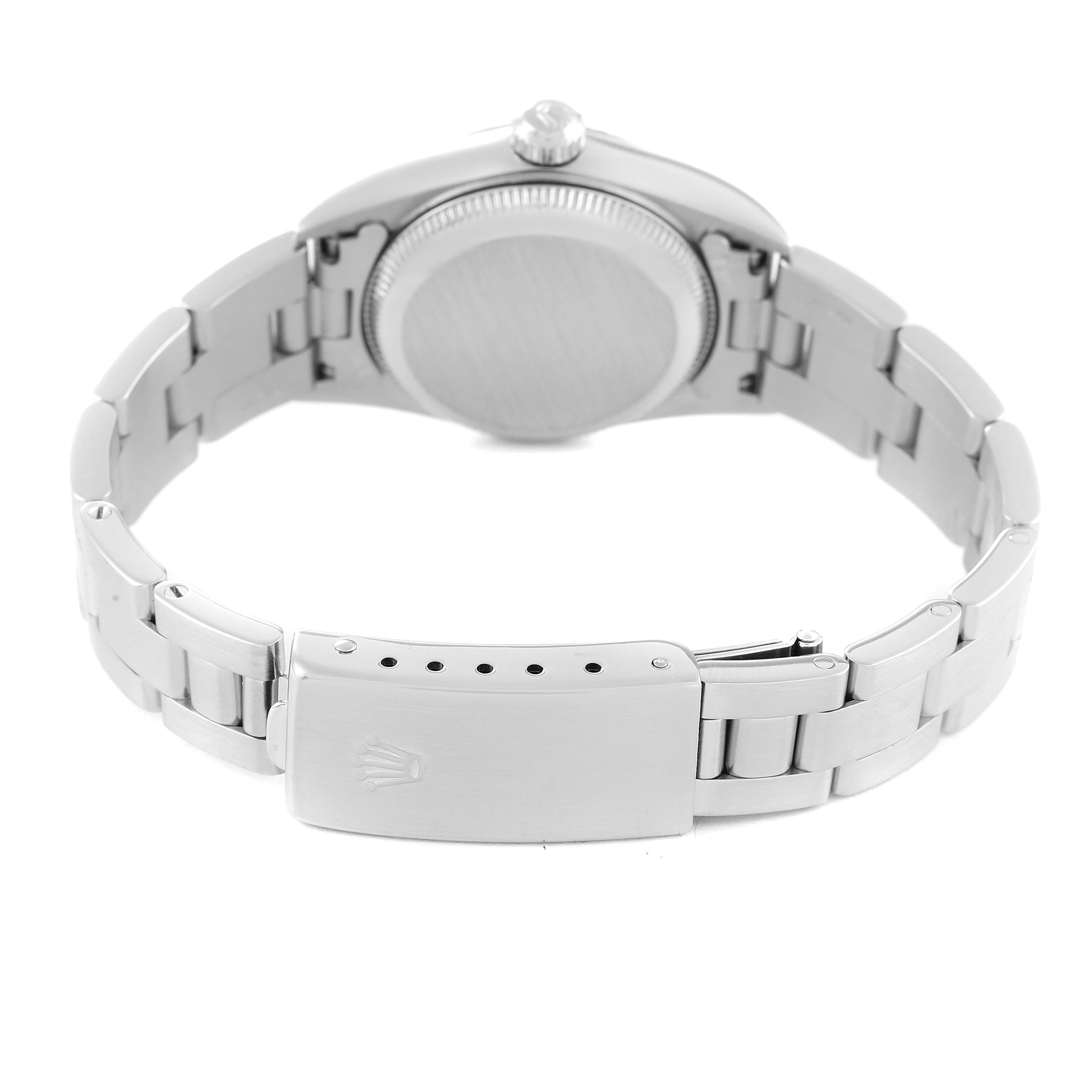 This image shows the back and clasp of a Rolex Oyster Perpetual 76094 Women
s Stainless Steel Silver Dial 76094 Women
s Stainless Steel Silver Dial watch, highlighting the bracelet and the back of the case.