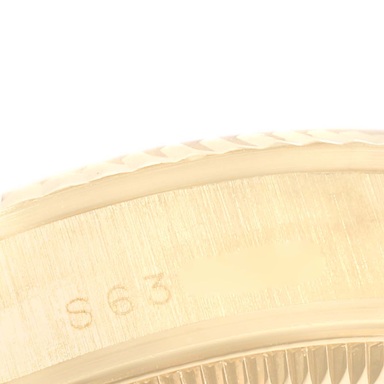 This close-up image shows the side profile of the bezel and part of the case of a Rolex President 68278 Women's Yellow Gold Mother of Pearl Dial 68278 Women's Yellow Gold Mother of Pearl Dial model watch.