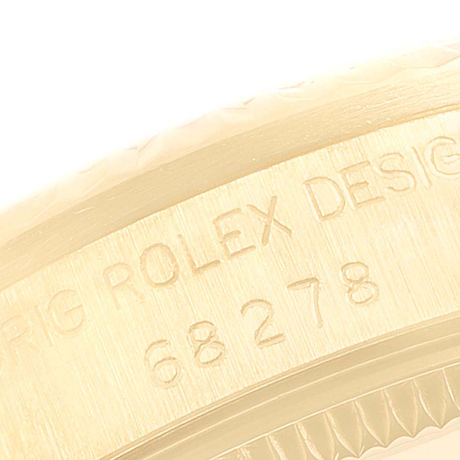 This close-up image shows the engraved model number and "Rolex Design" inscription on the President model by Rolex.