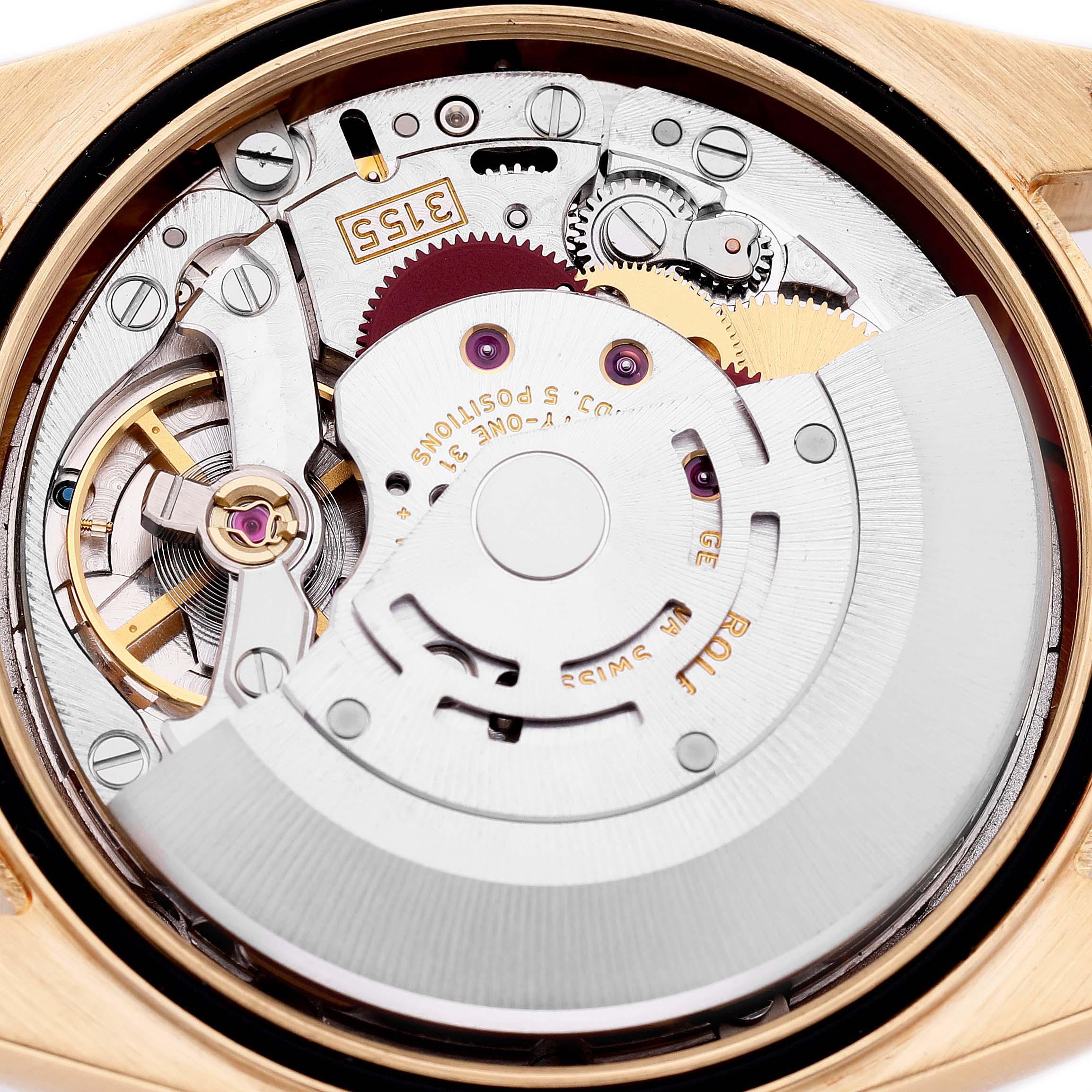 The image shows the movement mechanism of a Rolex President 118388 Men's Yellow Gold Mother of Pearl Dial watch, viewed from the back, highlighting gears and the rotor.