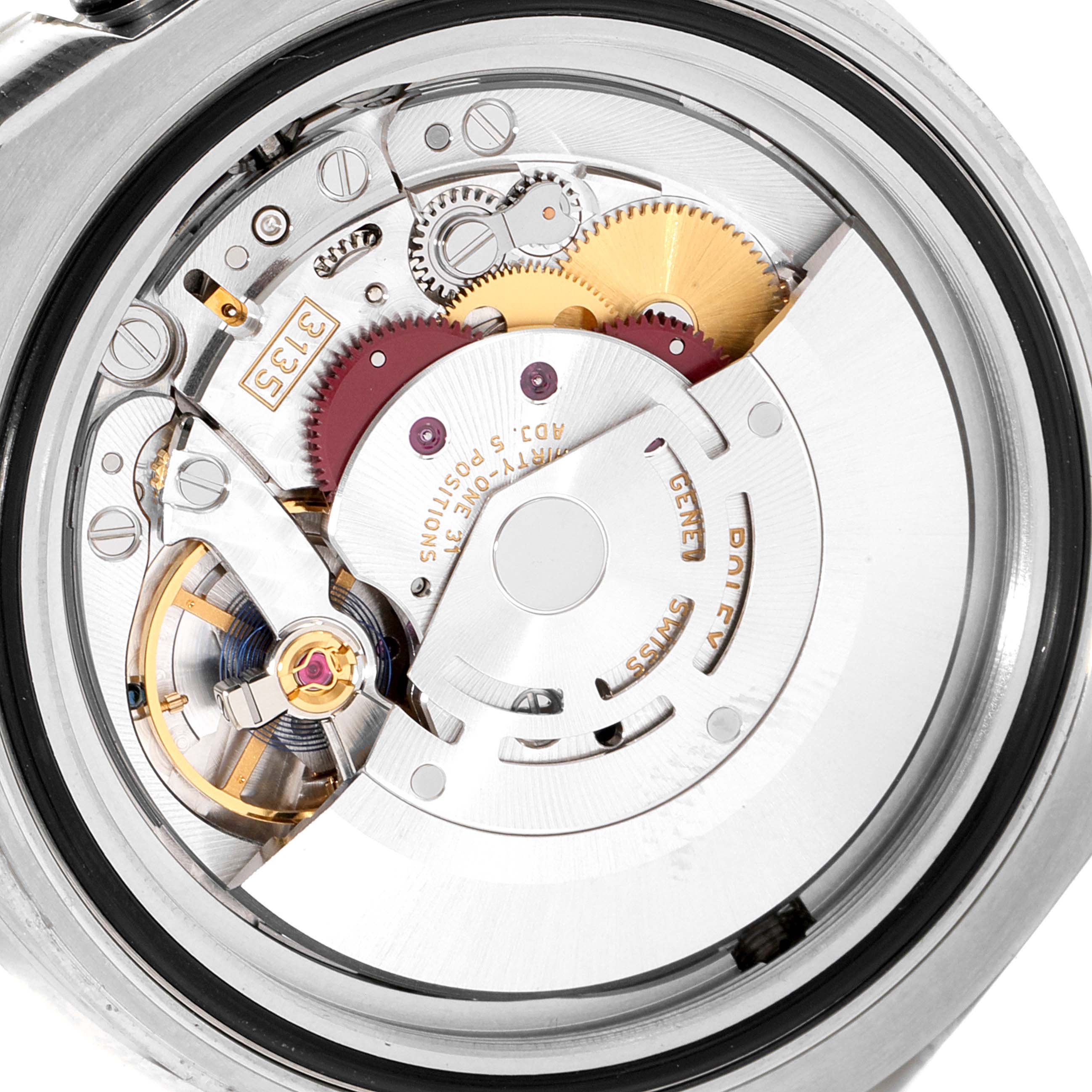 This is a close-up view of the movement and internal mechanisms of a Rolex Sea-Dweller 116600 Men's Stainless Steel Black Dial 116600 Men's Stainless Steel Black Dial watch.
