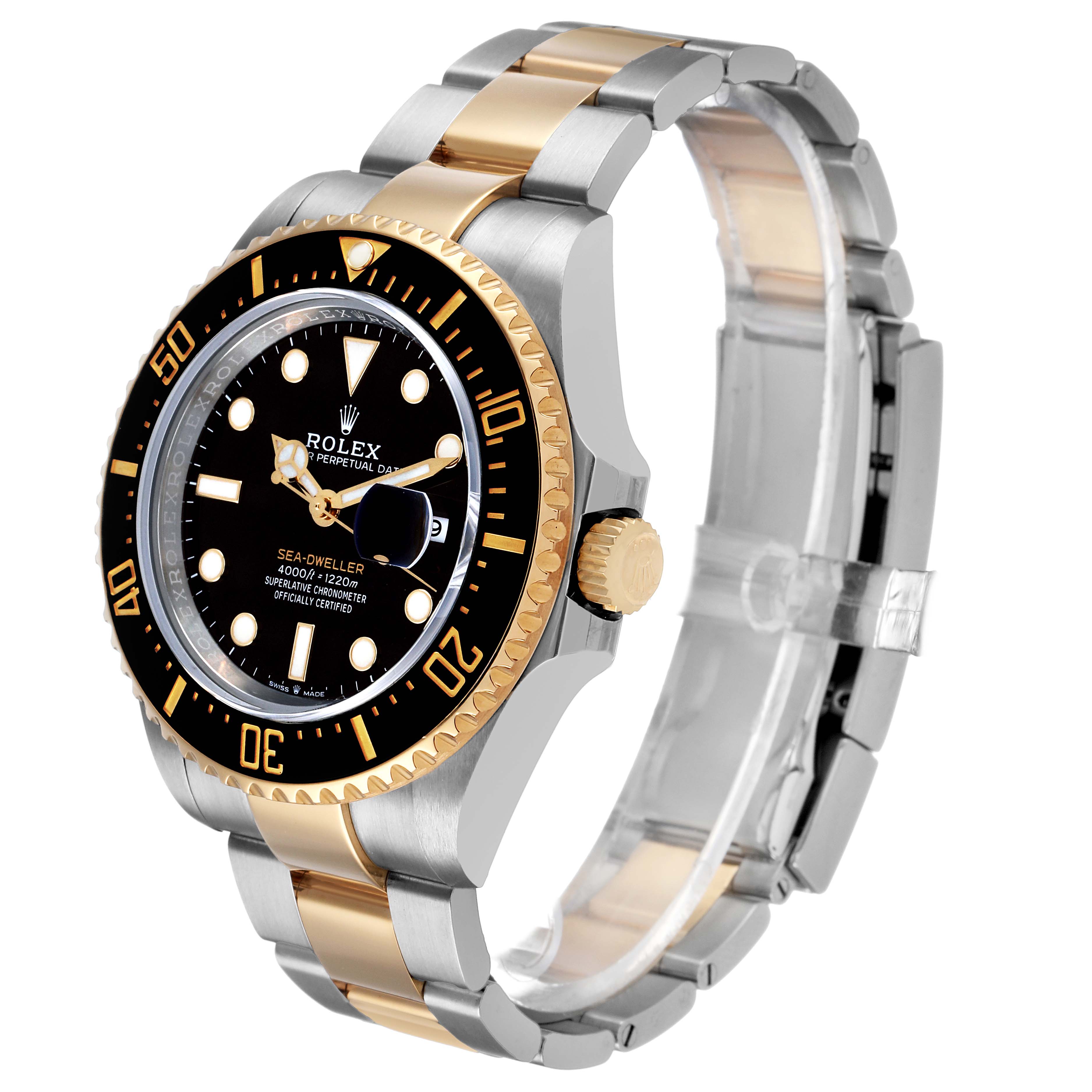 The Rolex Sea-Dweller 126603 Men's Steel and Gold (two tone) Black Dial watch is shown at a 3/4 angle, highlighting its bezel, dial, crown, and metal bracelet.
