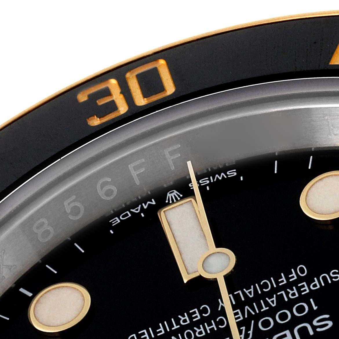 This image shows a close-up of the face, bezel, and hands of a Rolex Submariner 126613 Men's Steel and Gold (two tone) Black Dial 126613 Men's Steel and Gold (two tone) Black Dial watch, specifically focusing on the "30" marker.