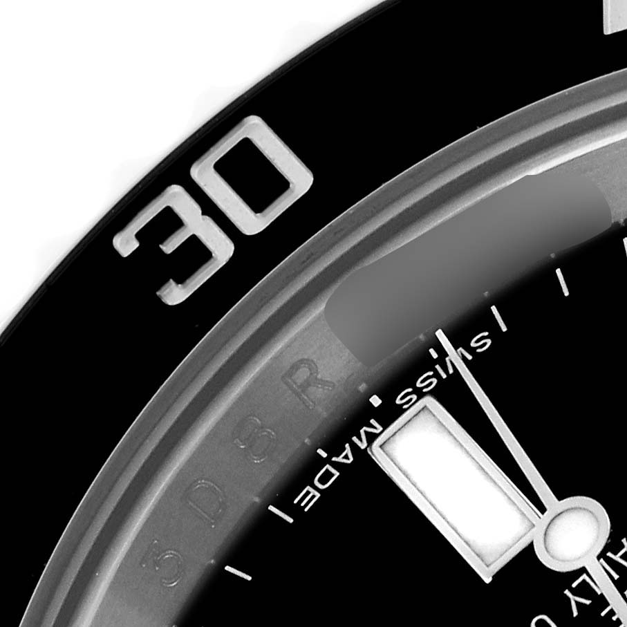 The image shows a close-up of the bezel and dial of a Rolex Submariner 116610LN Men's Stainless Steel Black Dial 116610LN Men's Stainless Steel Black Dial watch, highlighting the "30" on the bezel and part of the watch hands.