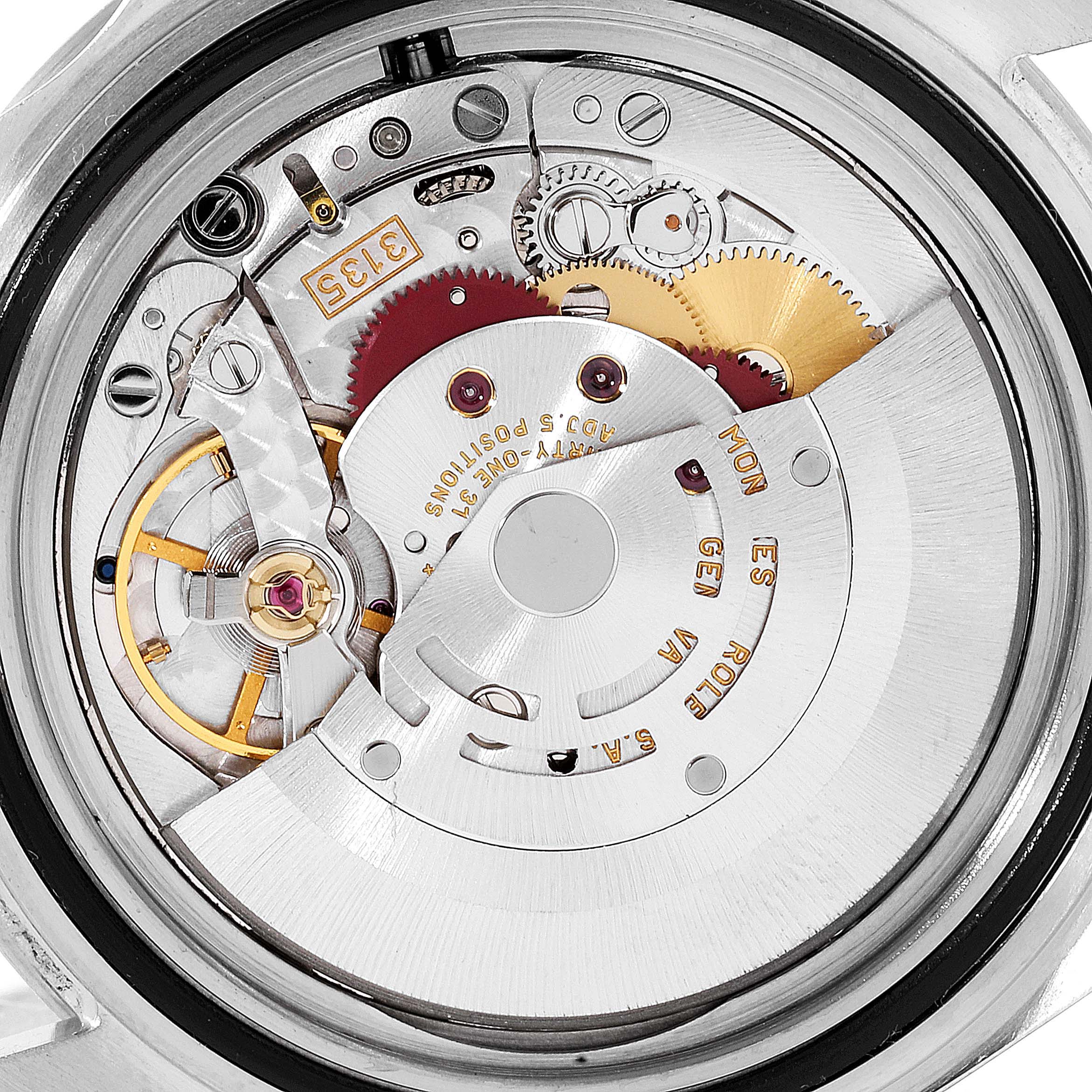 This image shows the intricate internal mechanism and movement of a Rolex Submariner 16610LV Men's Stainless Steel Black Dial 16610LV Men's Stainless Steel Black Dial watch from a close-up, top-down angle.
