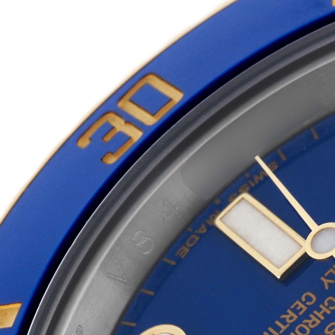 This close-up angle shows the blue bezel with the number 30 and part of the dial of the Rolex Submariner 116613 Men's Steel and Gold (two tone) Blue Dial 116613 Men's Steel and Gold (two tone) Blue Dial model.