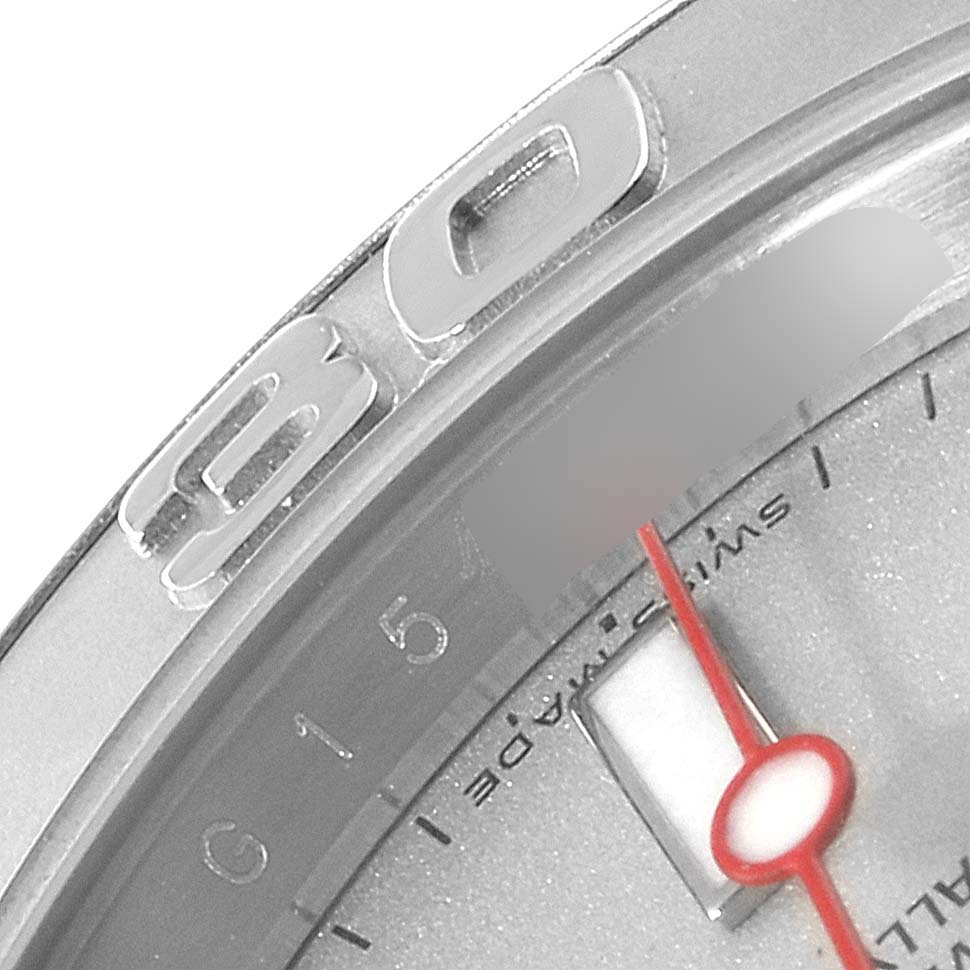 This close-up image of the Rolex Yacht-Master 16622 Men
s Stainless Steel Silver Dial 16622 Men
s Stainless Steel Silver Dial watch shows part of the bezel, dial, and red second hand.