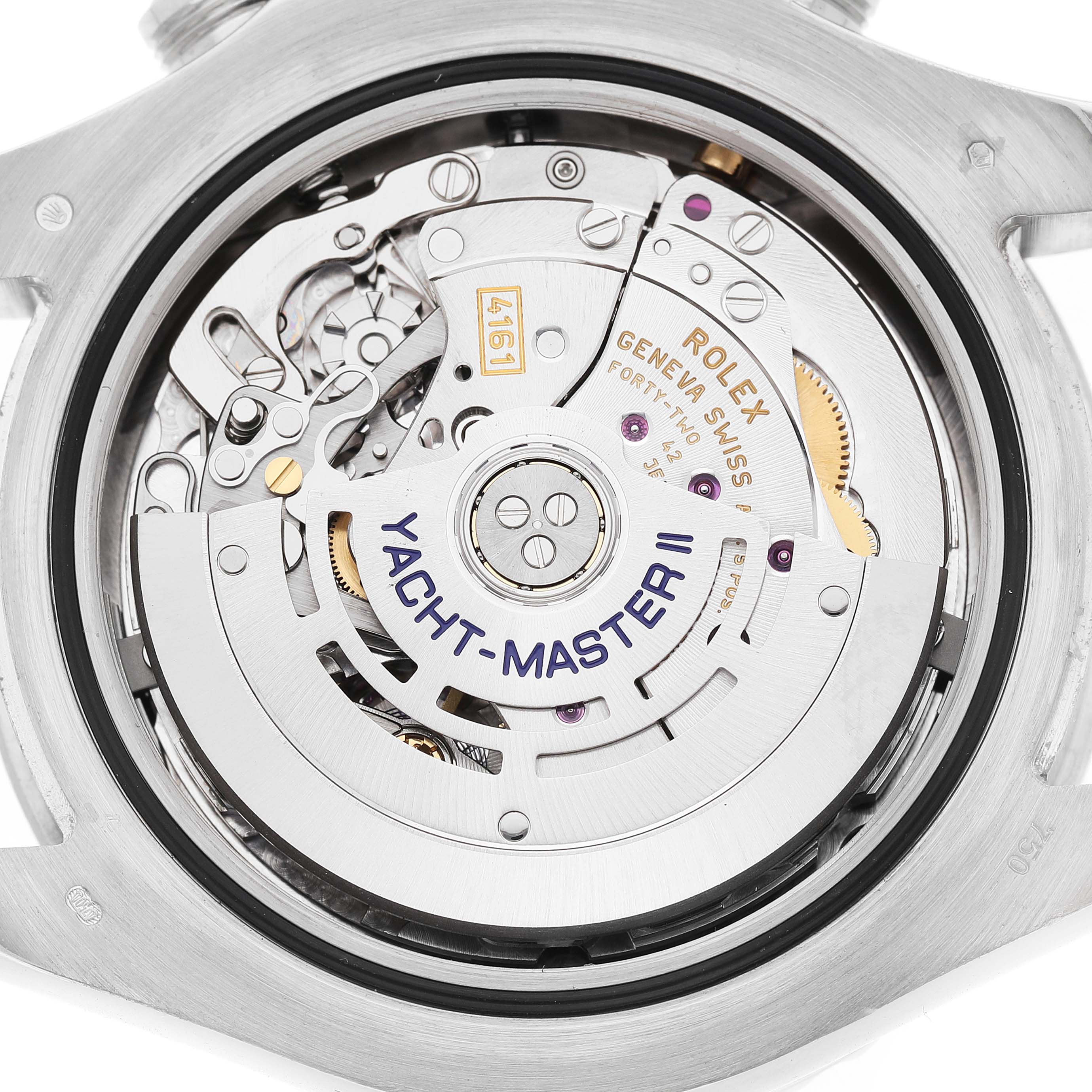 The image shows the back of the Rolex Yacht-Master 116689 Men's White Gold White Dial II, highlighting the movement mechanism and rotor.