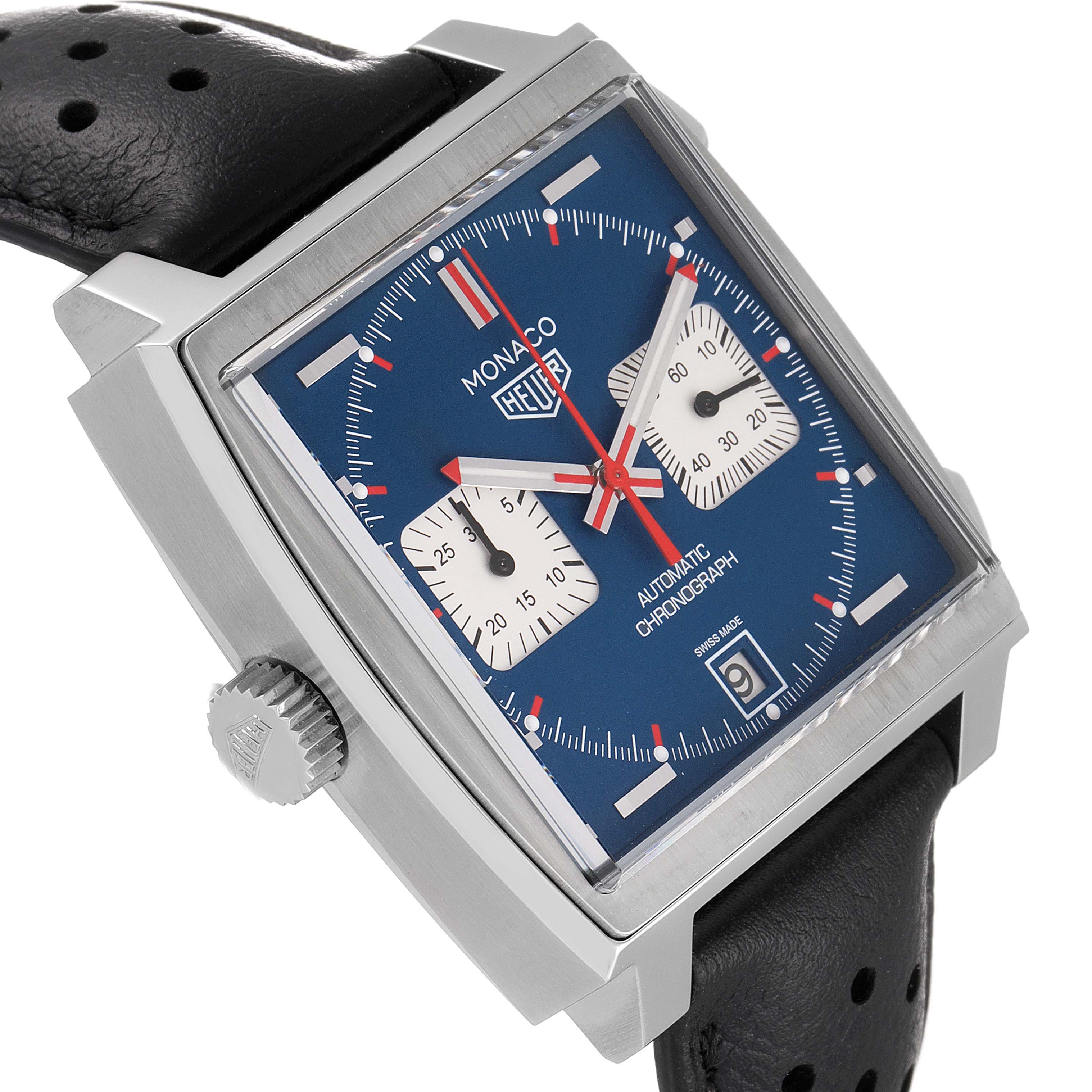 The image shows a close-up, angled view of a Tag Heuer Monaco CAW211P Men
s Stainless Steel Blue Dial CAW211P Men
s Stainless Steel Blue Dial watch, highlighting the blue dial, sub-dials, and black perforated leather strap.