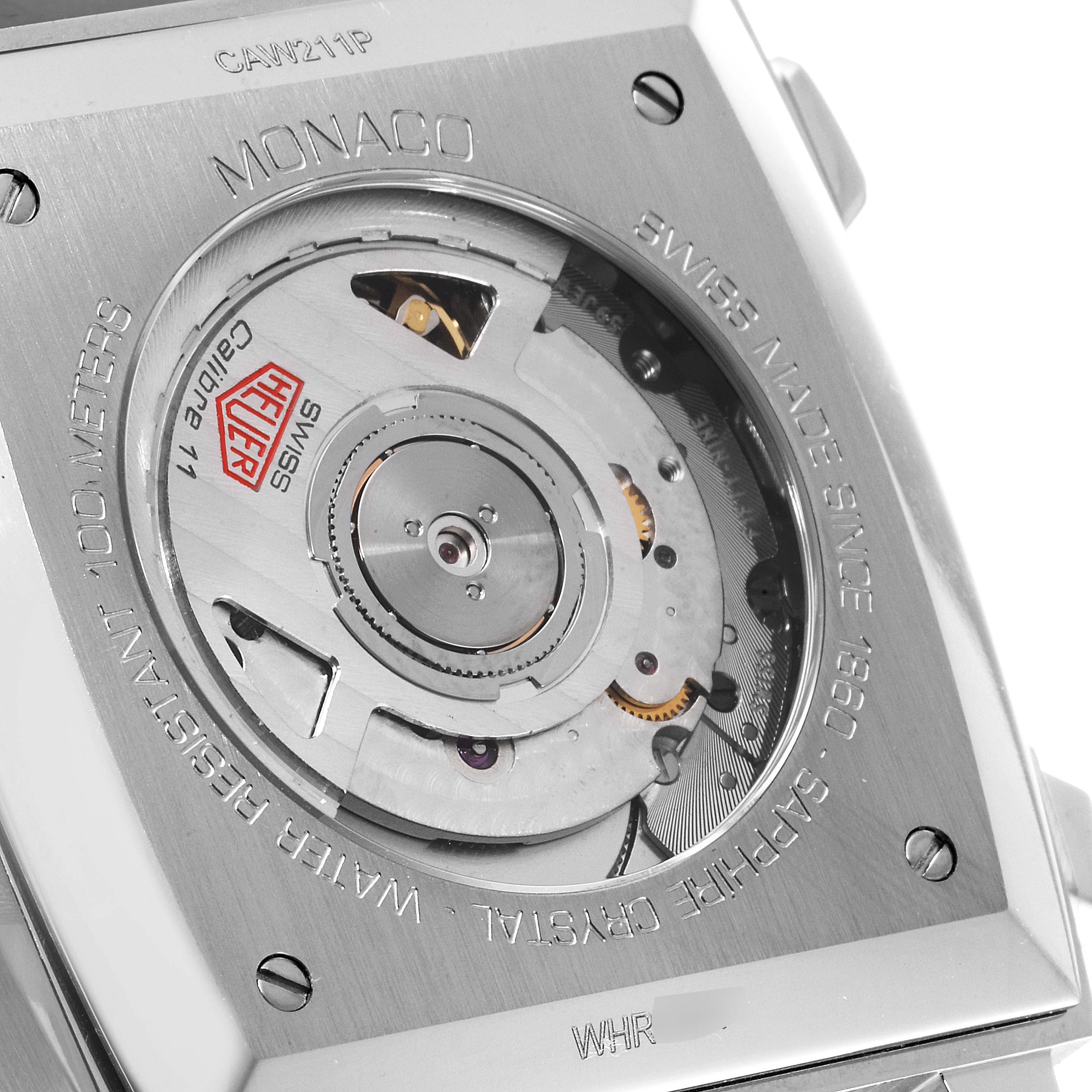 The image shows the back view of a Tag Heuer Monaco CAW211P Men
s Stainless Steel Blue Dial CAW211P Men
s Stainless Steel Blue Dial watch, displaying its intricate movement and engraved details.