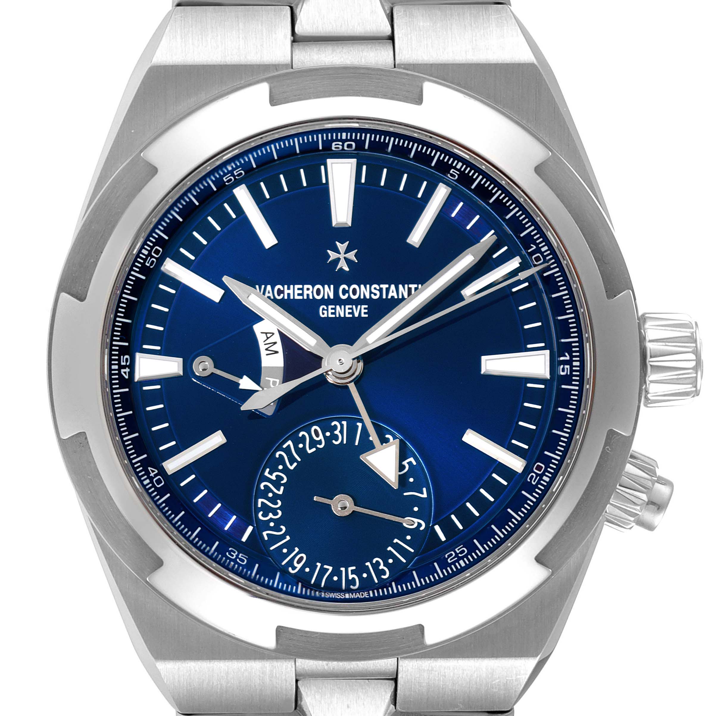 The image is a frontal view of a Vacheron Constantin Overseas 7900V/110A-B334 Men's Stainless Steel Blue Dial 7900V/110A-B334 Men's Stainless Steel Blue Dial model watch, showcasing its blue dial, hands, markers, and steel case.
