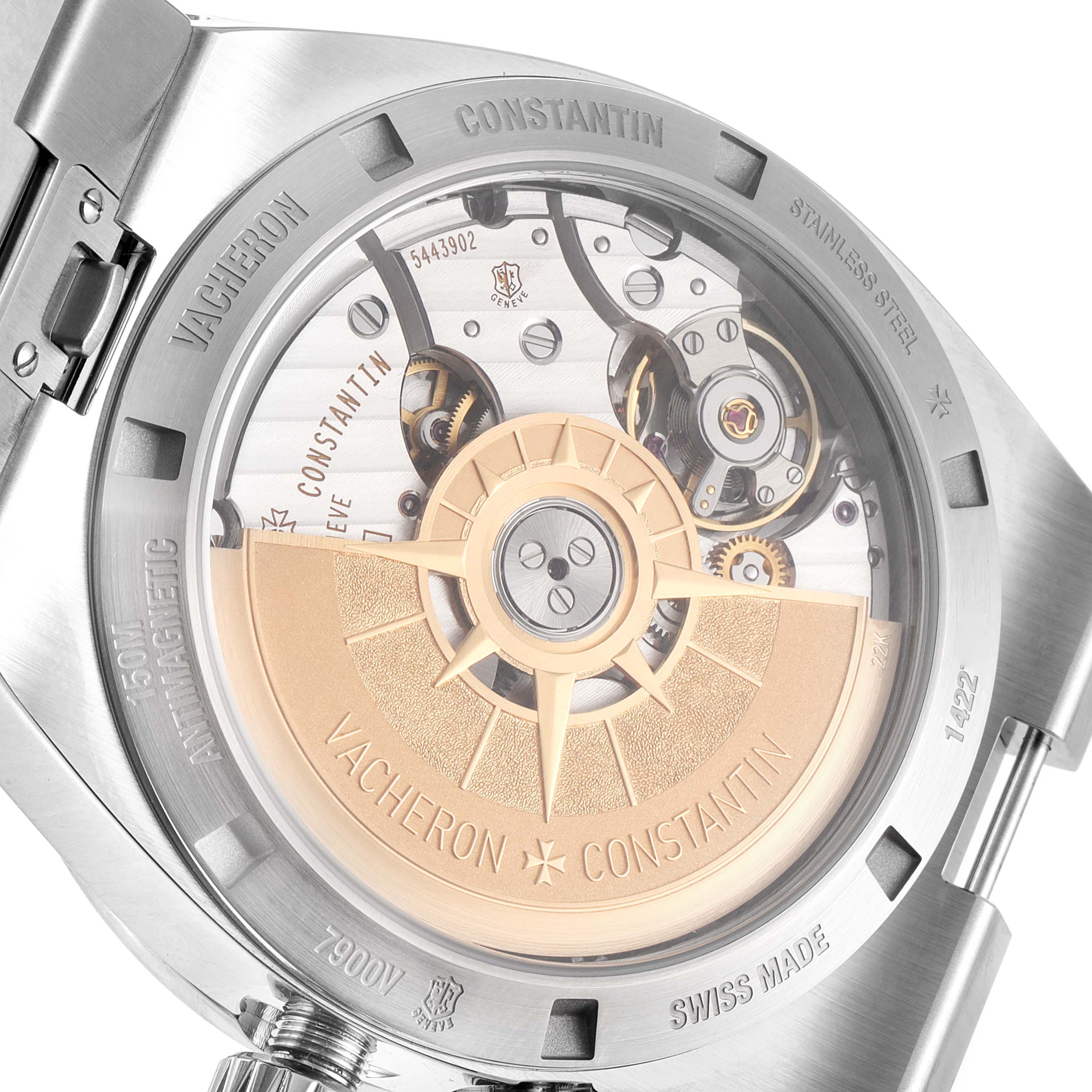 The image shows the back of the Vacheron Constantin Overseas 7900V/110A-B334 Men's Stainless Steel Blue Dial 7900V/110A-B334 Men's Stainless Steel Blue Dial watch, revealing its intricate mechanical movement and rotor.