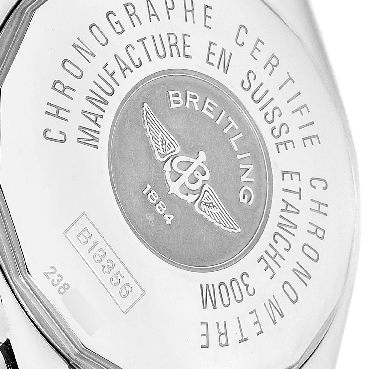 This image shows the case back of a Breitling Chronomat B13356 Men's Steel and Gold (two tone) Burgundy Dial B13356 Men's Steel and Gold (two tone) Burgundy Dial watch, highlighting its engravings and logo.