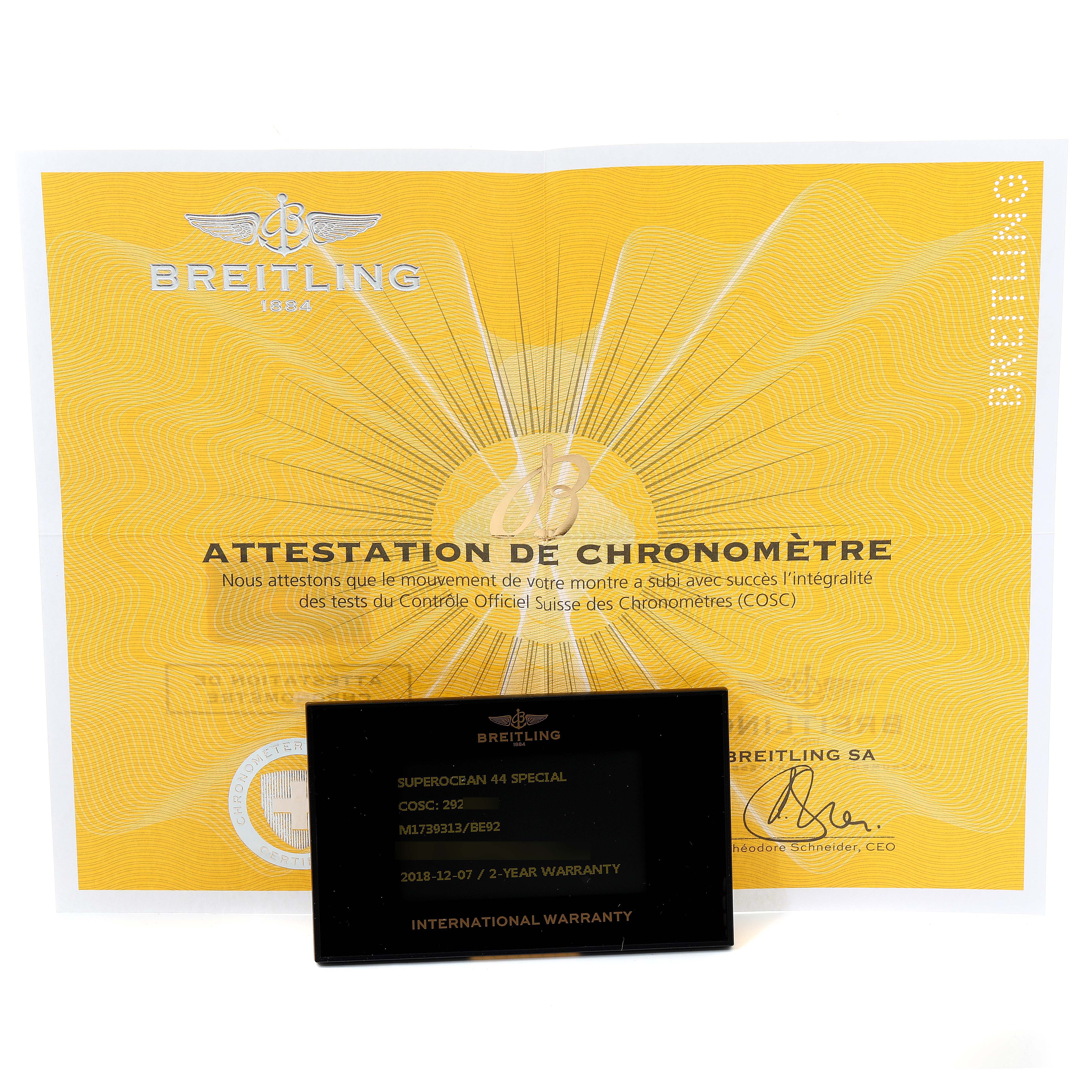 The image shows the warranty card and attestation certificate for a Breitling Superocean M17393 Men
s Stainless Steel Black Dial M17393 Men
s Stainless Steel Black Dial 44 Special.